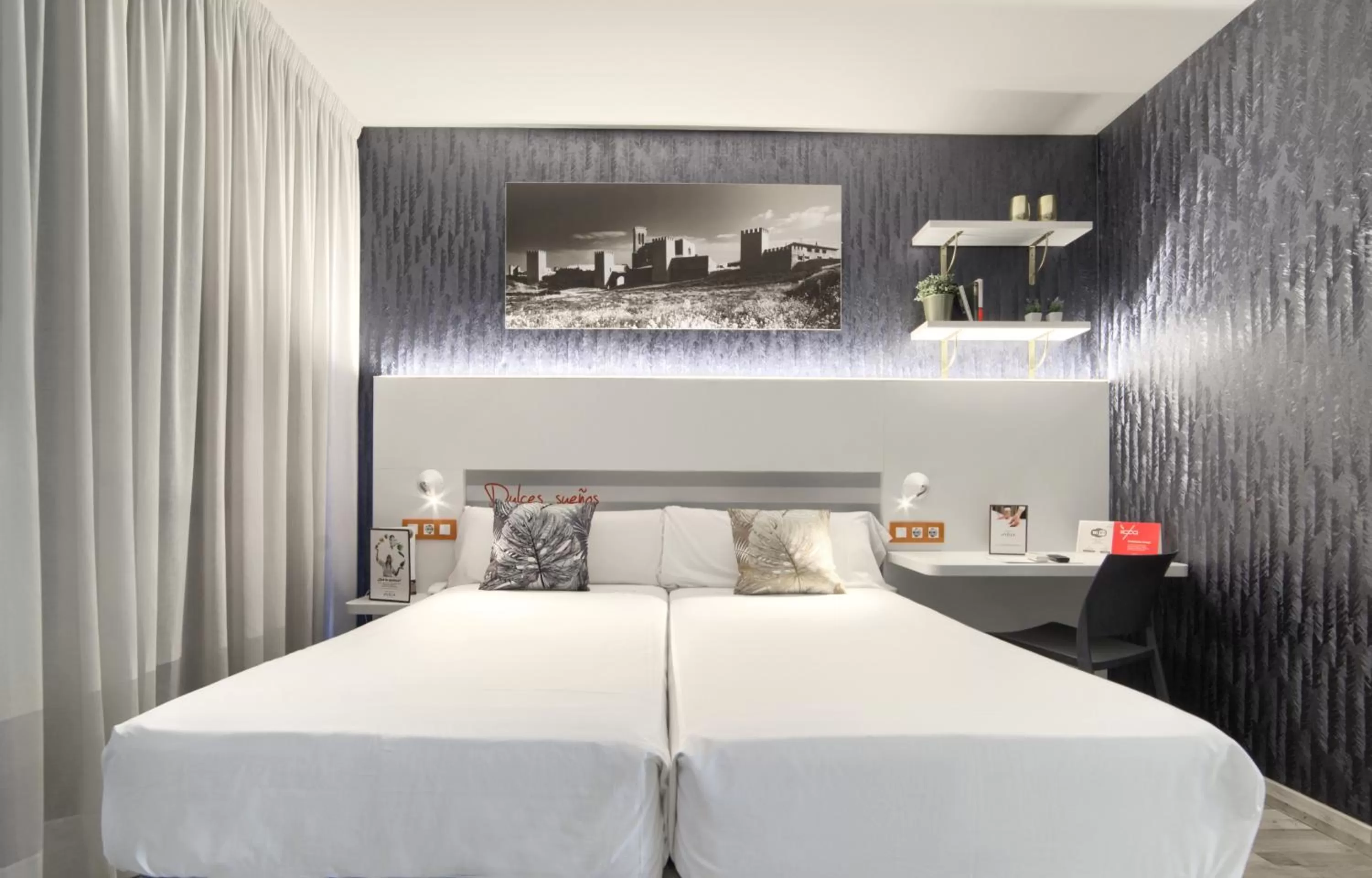 Bed in Hotel Luze El Villa