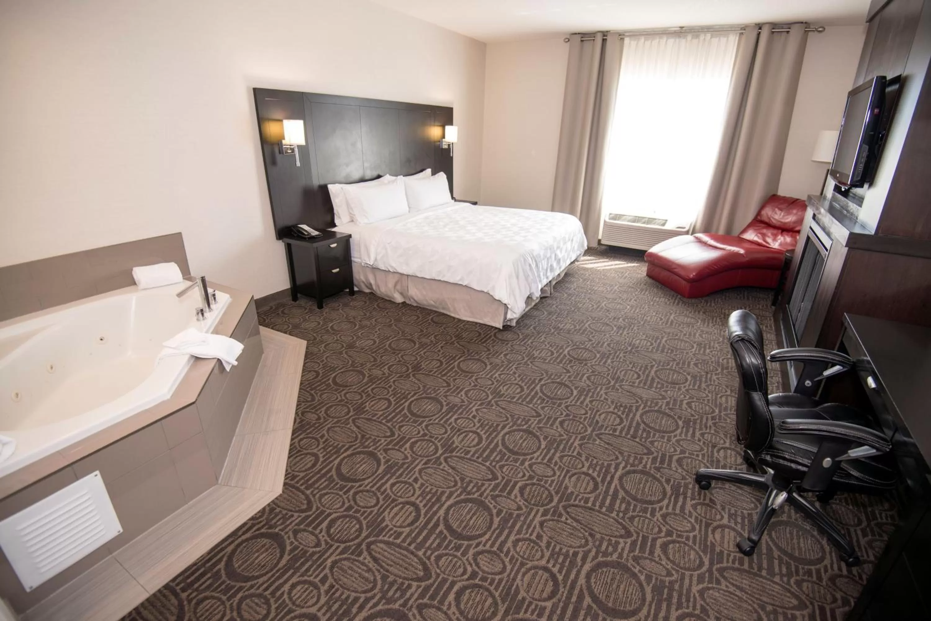 Bedroom, Bed in Holiday Inn Hotel & Suites Red Deer by IHG