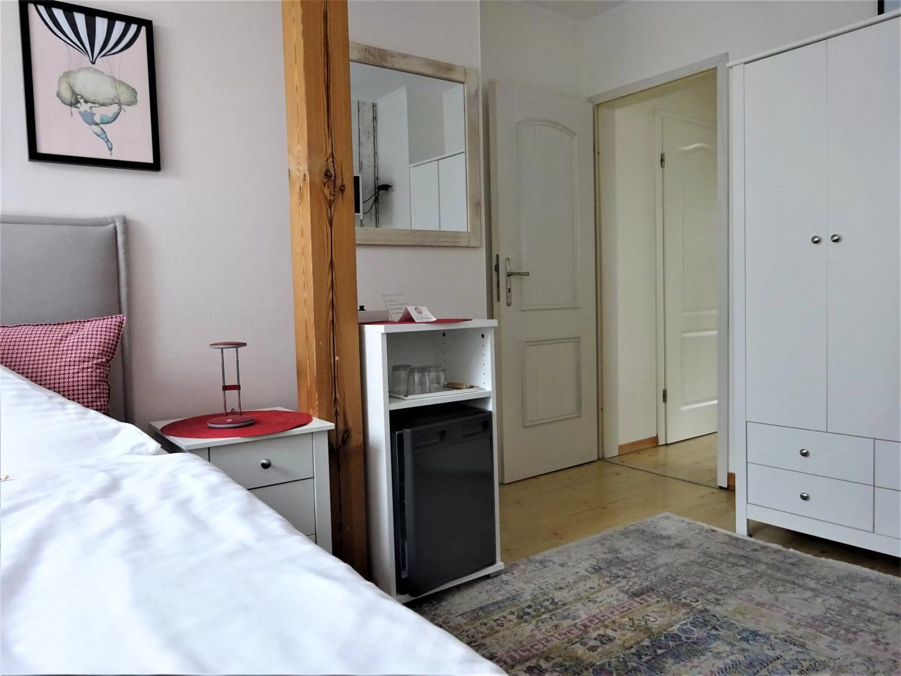 Communal lounge/ TV room, Bed in Hotel Pension Zur Fährbrücke