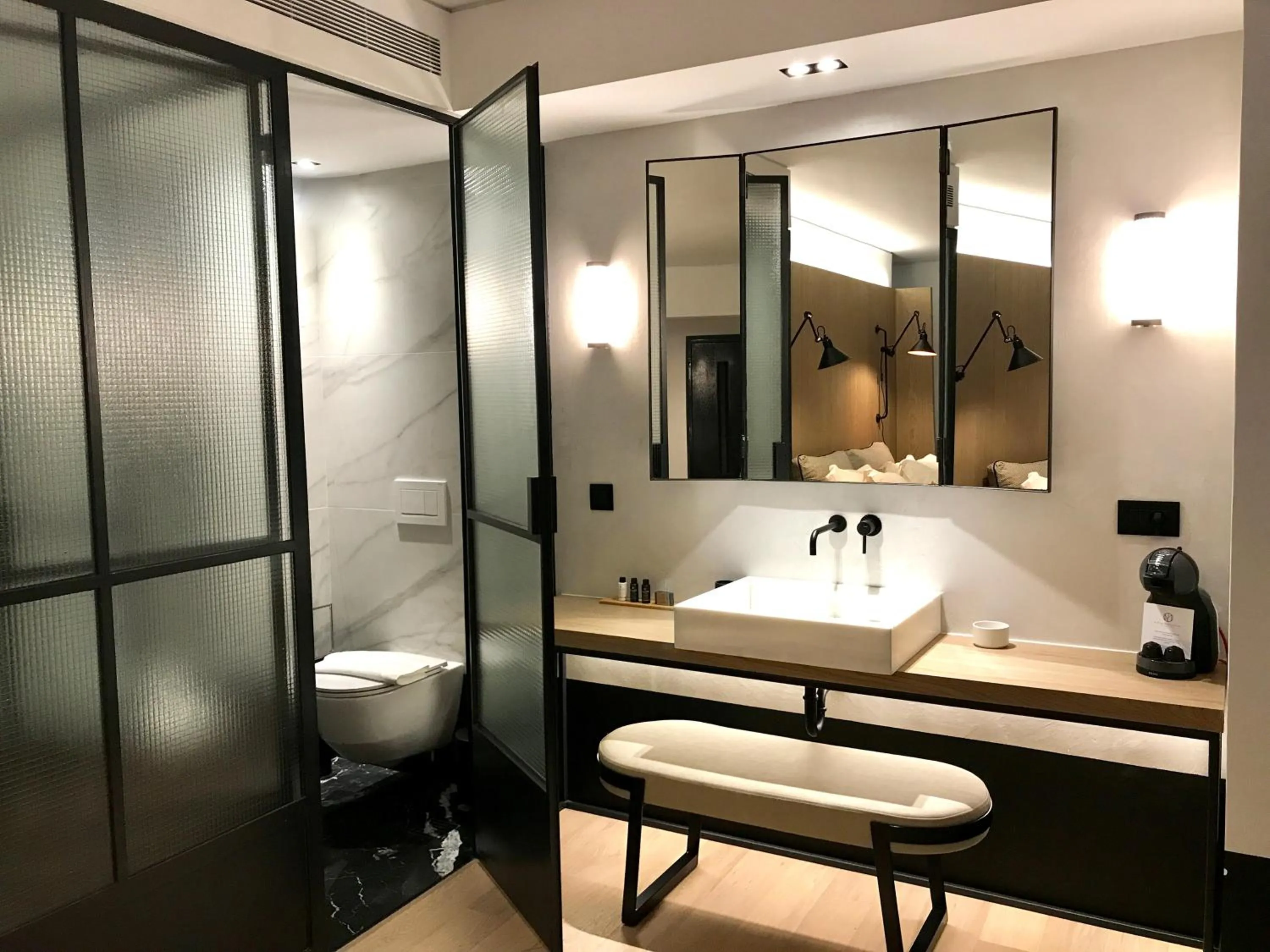 Bathroom in Niki Athens Hotel