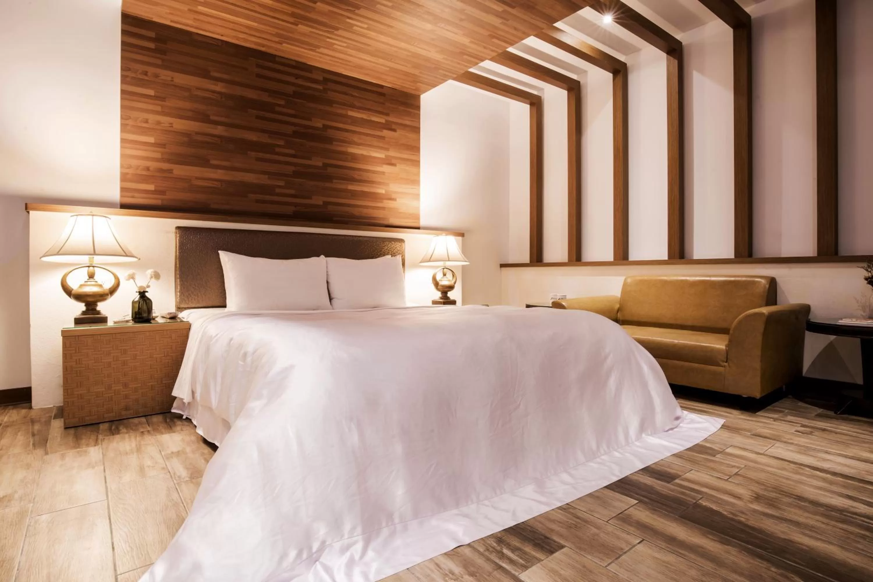 Bed in Duo Romance Hotel