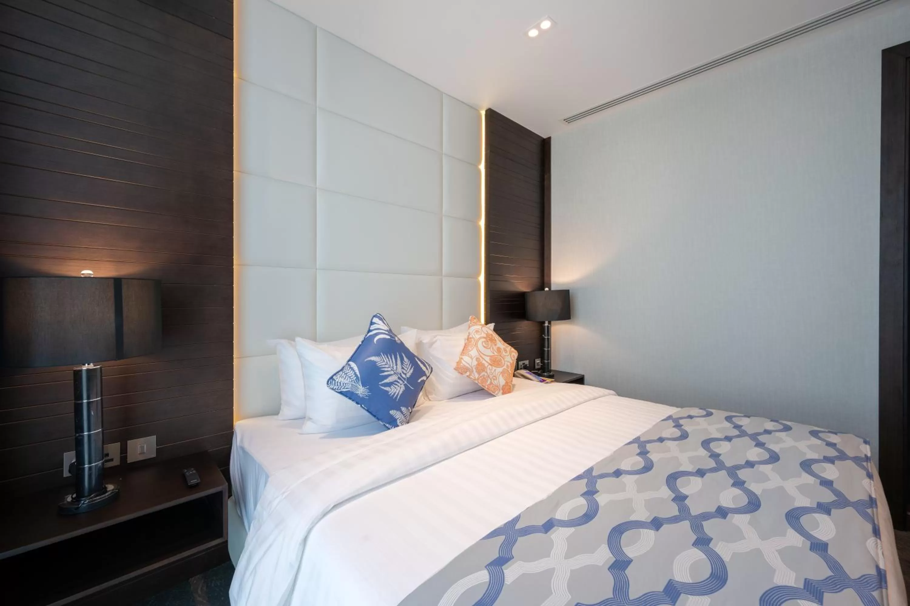 Bed in Ramada Encore Doha by Wyndham