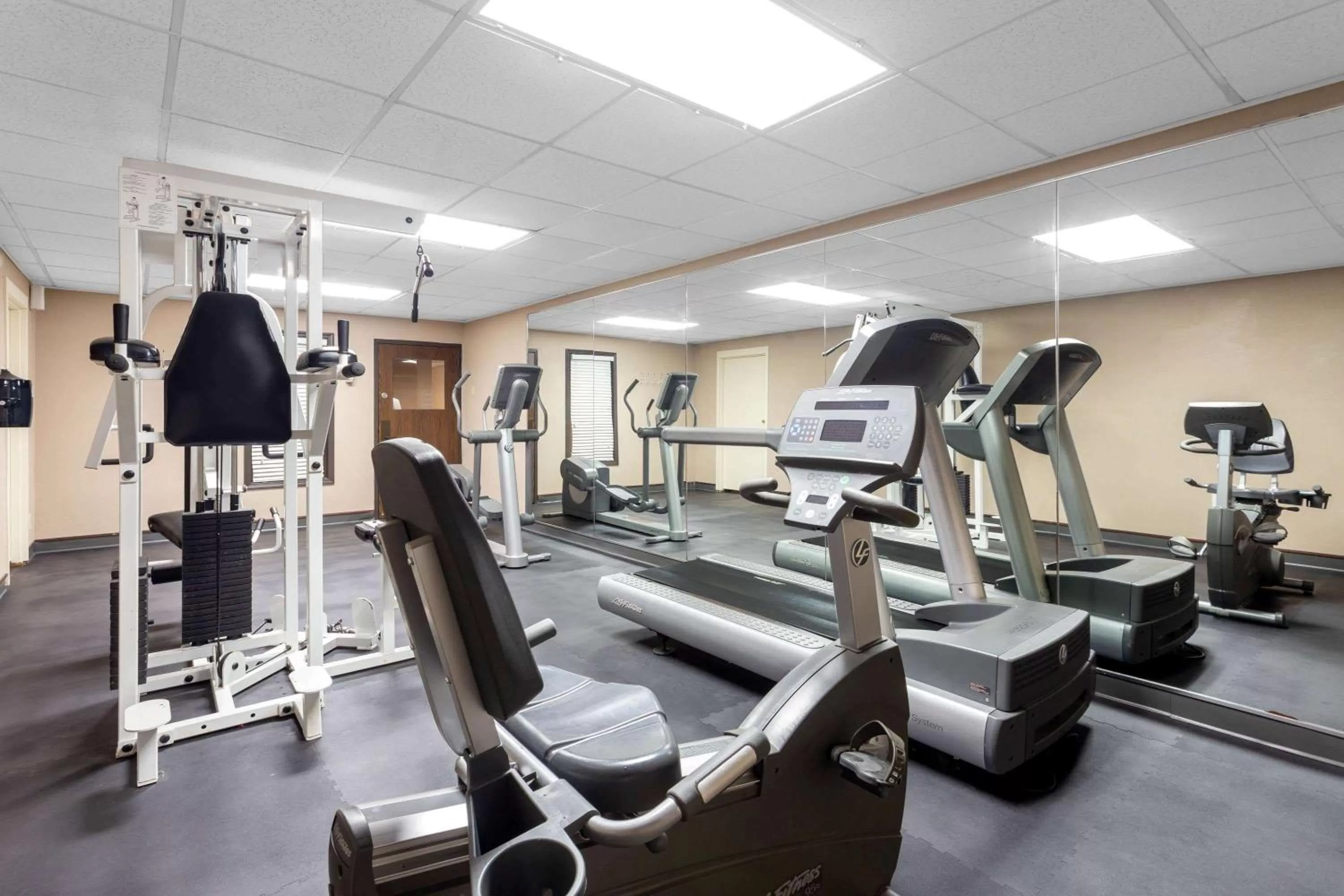 Fitness centre/facilities in AmericInn by Wyndham Janesville