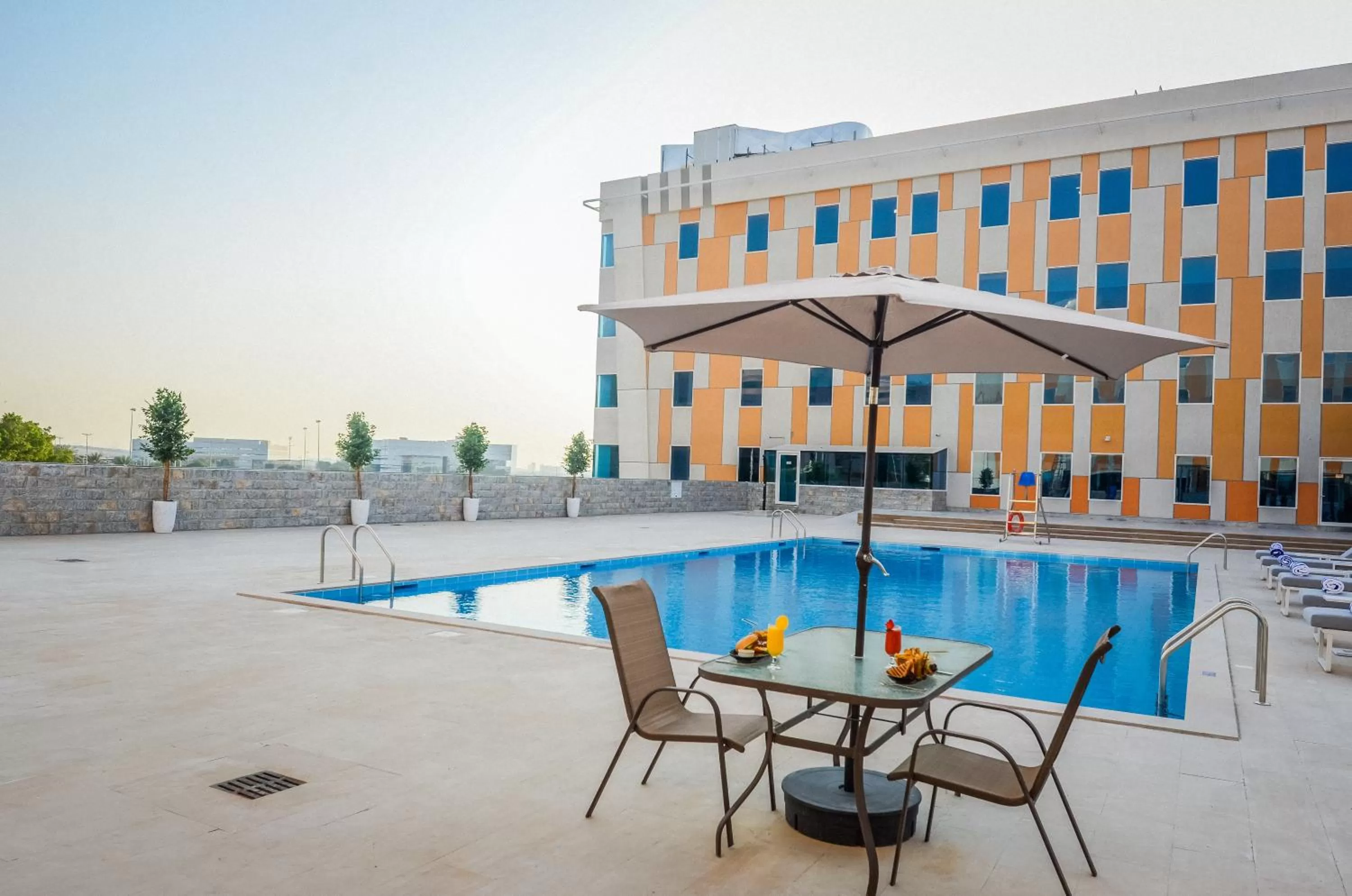 Swimming pool in VOGO Grand Hotel Formerly Best Western Plus Hotel Dubai Academic City