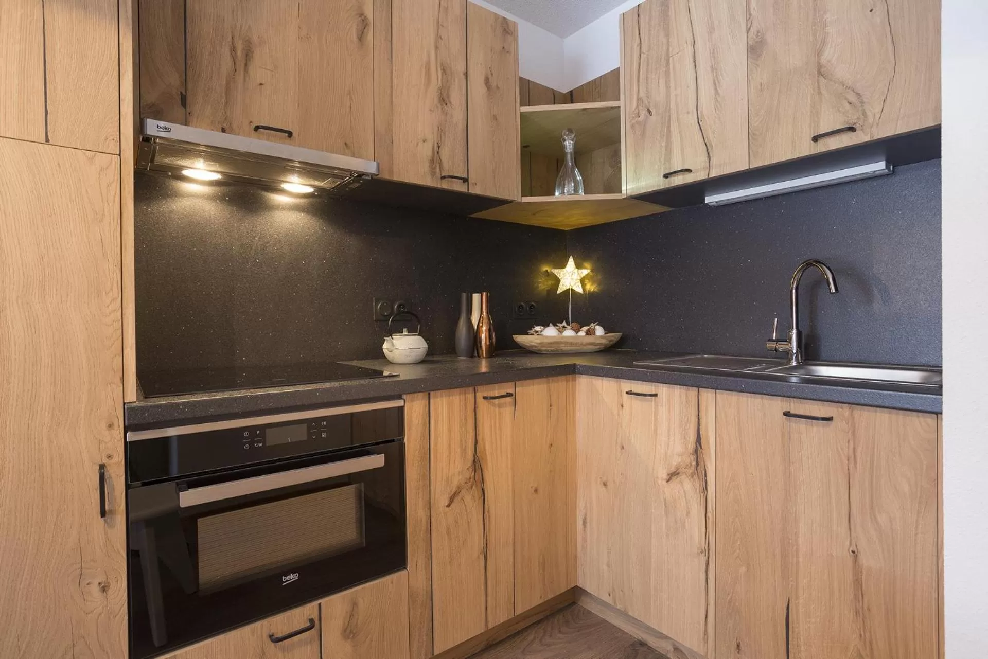 Kitchen or kitchenette in Résidence Club MMV La Clé des Cimes