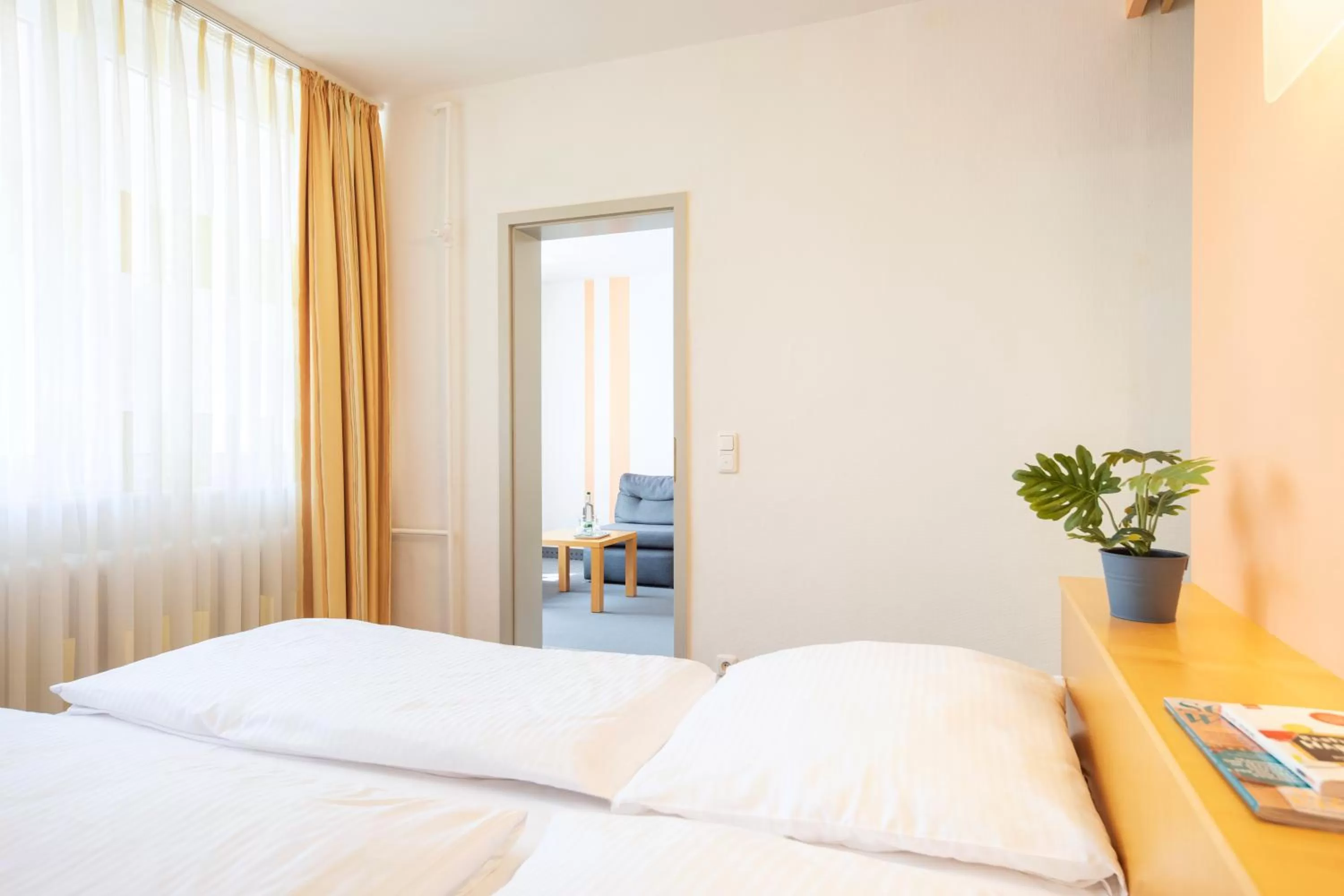 Photo of the whole room, Bed in ACHAT Hotel Suhl