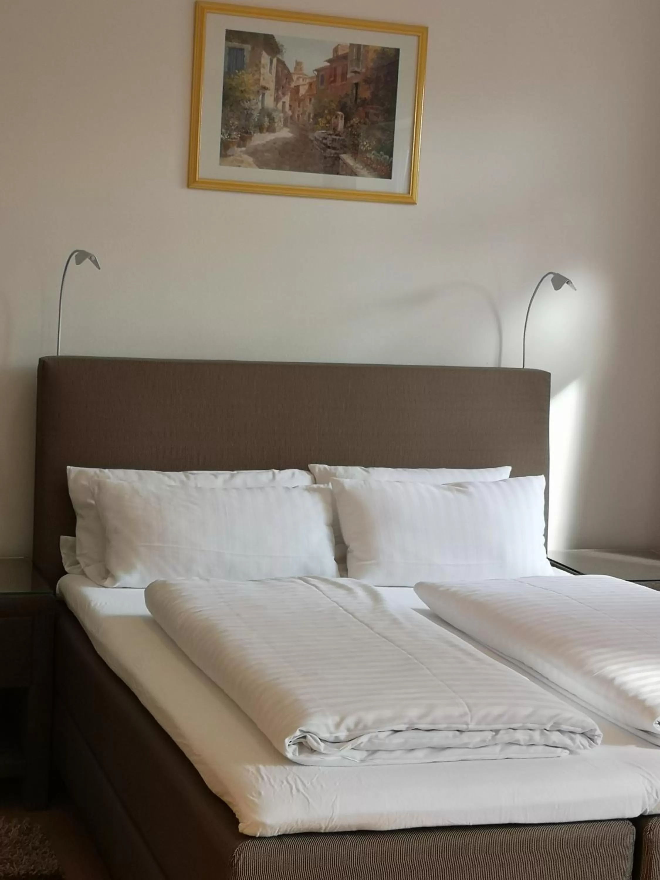 Bed in Tuniberg Restaurant Hotel