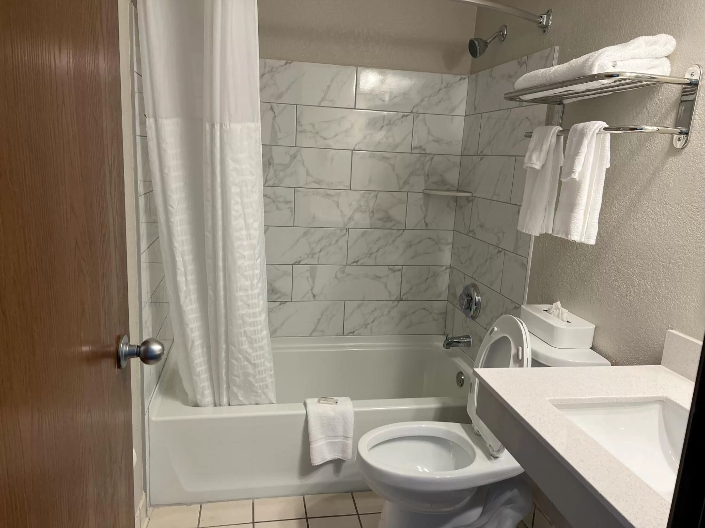 Toilet in Days Inn by Wyndham Orange Park/Jacksonville