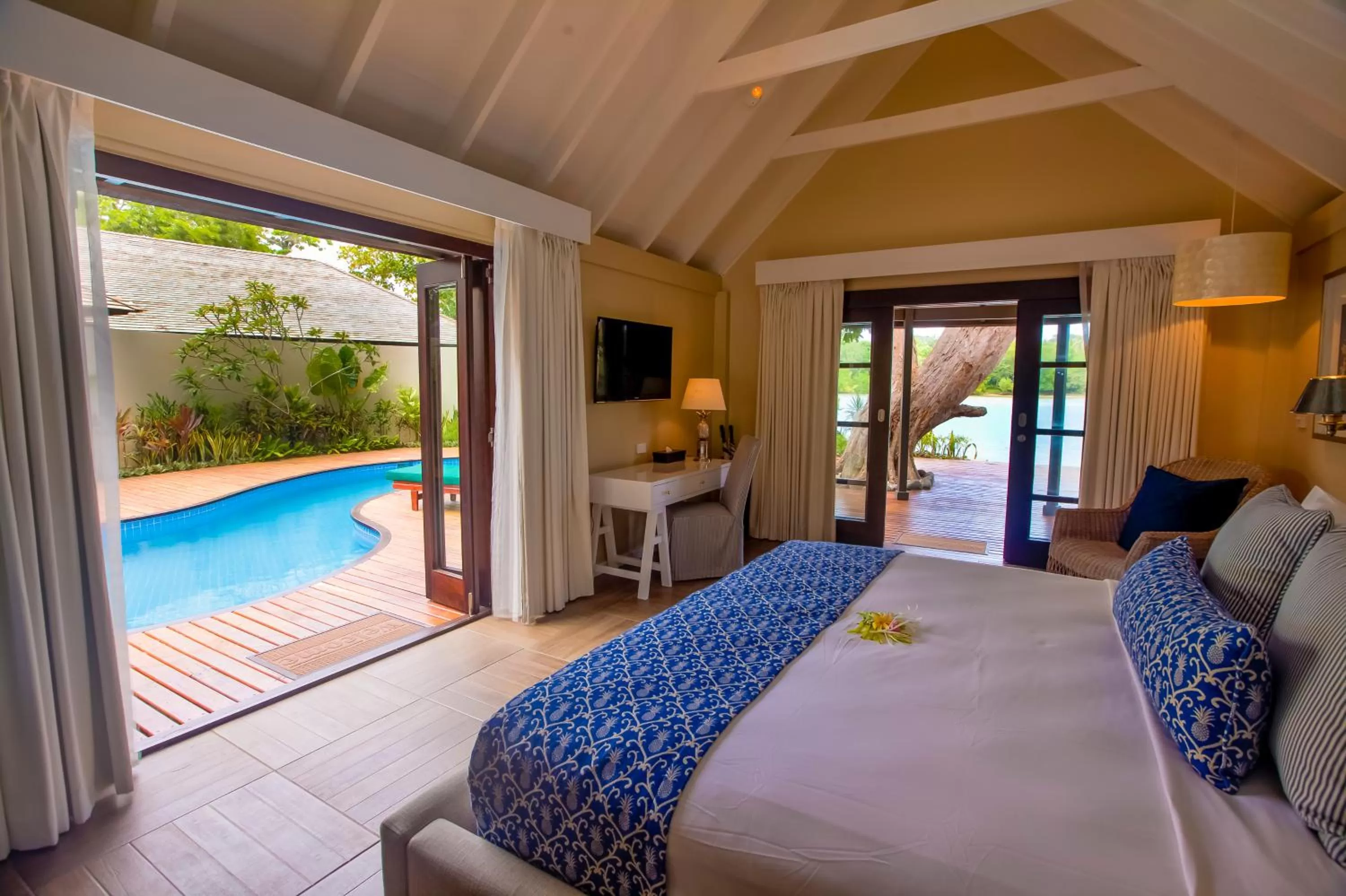 Swimming pool, Bed in Warwick Le Lagon Resort & Spa, Vanuatu