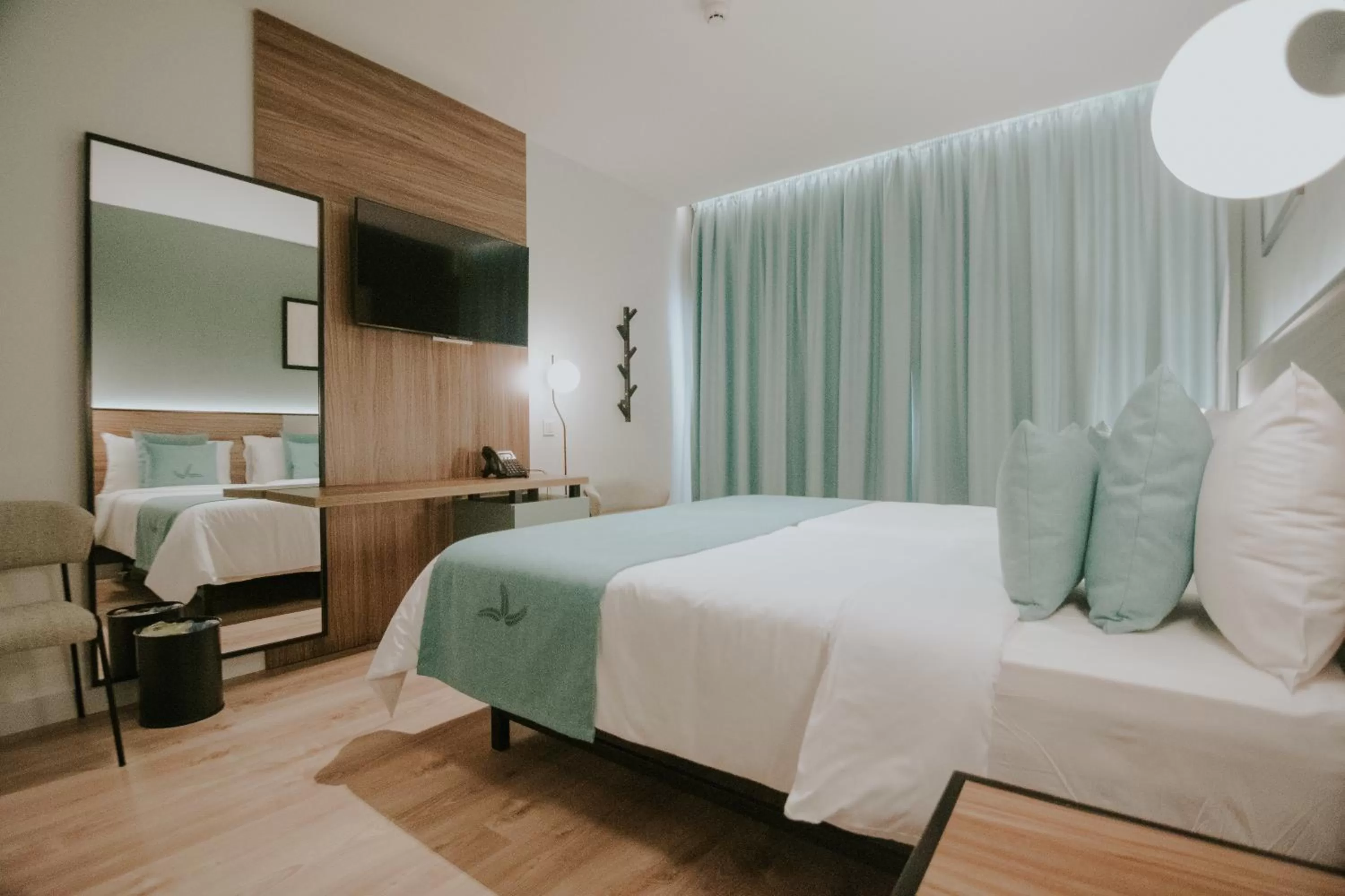 Bed in Catalina Plaza Hotel Sostenible