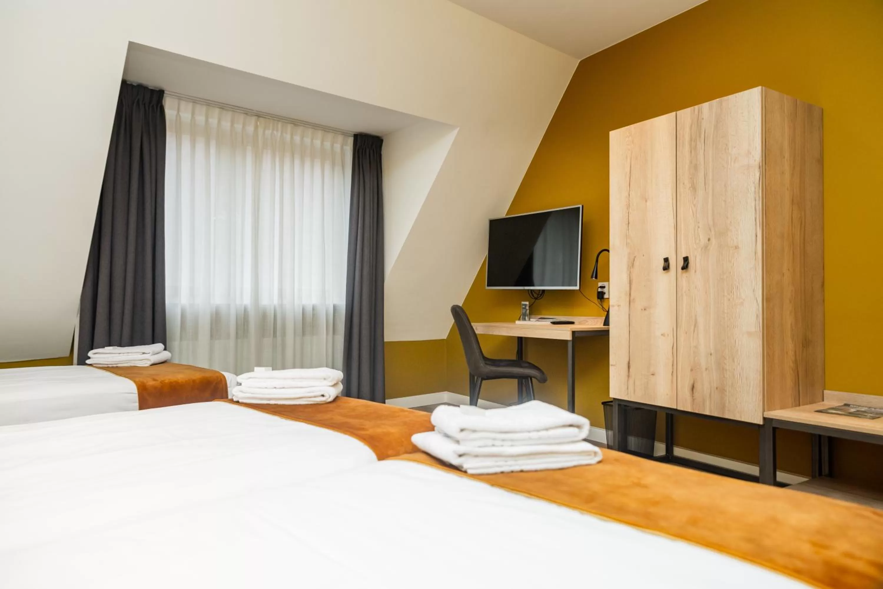 Bed, TV/Entertainment Center in Hotel Onder De Linden