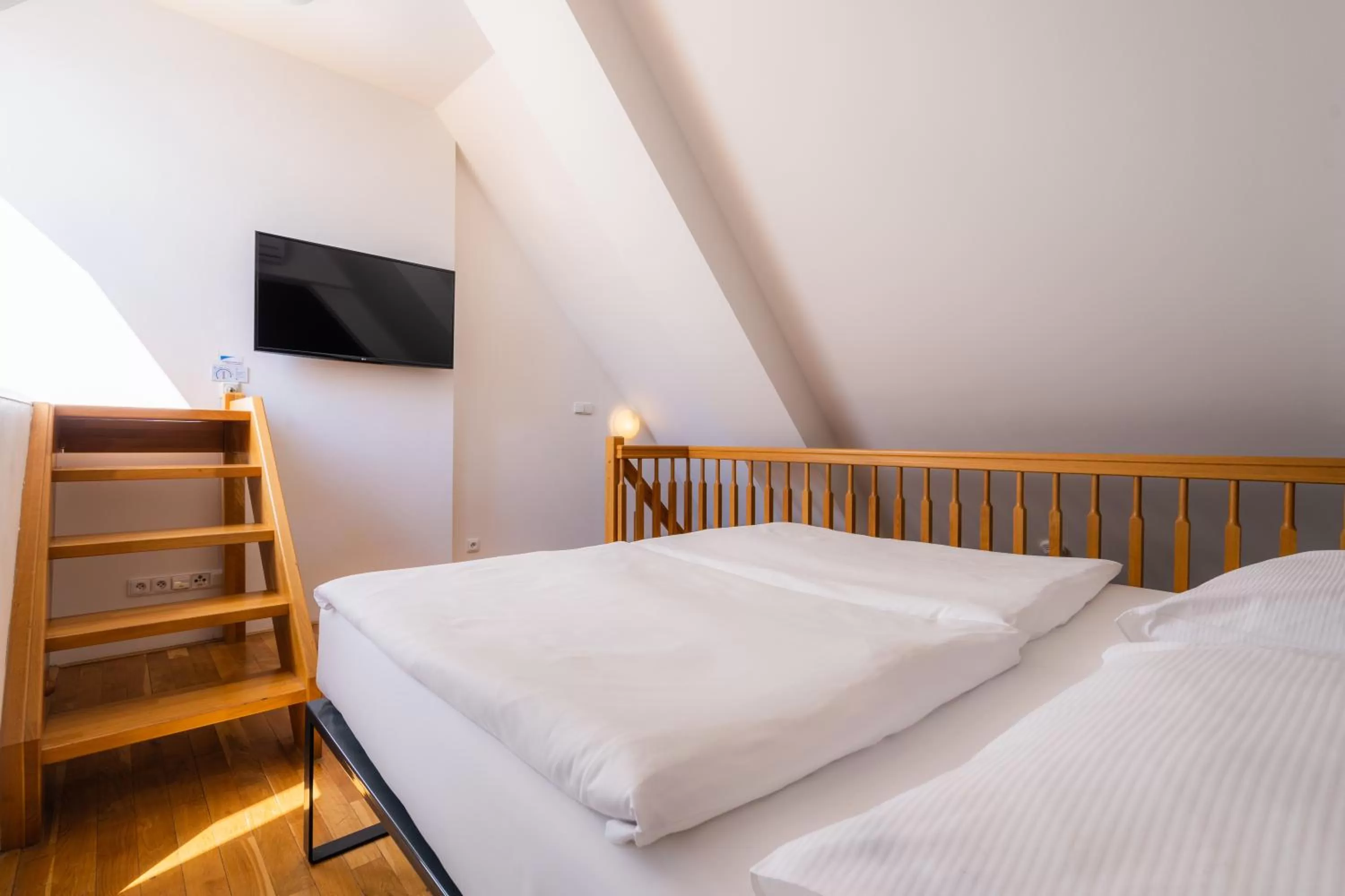 Bed in EA ApartHotel Melantrich