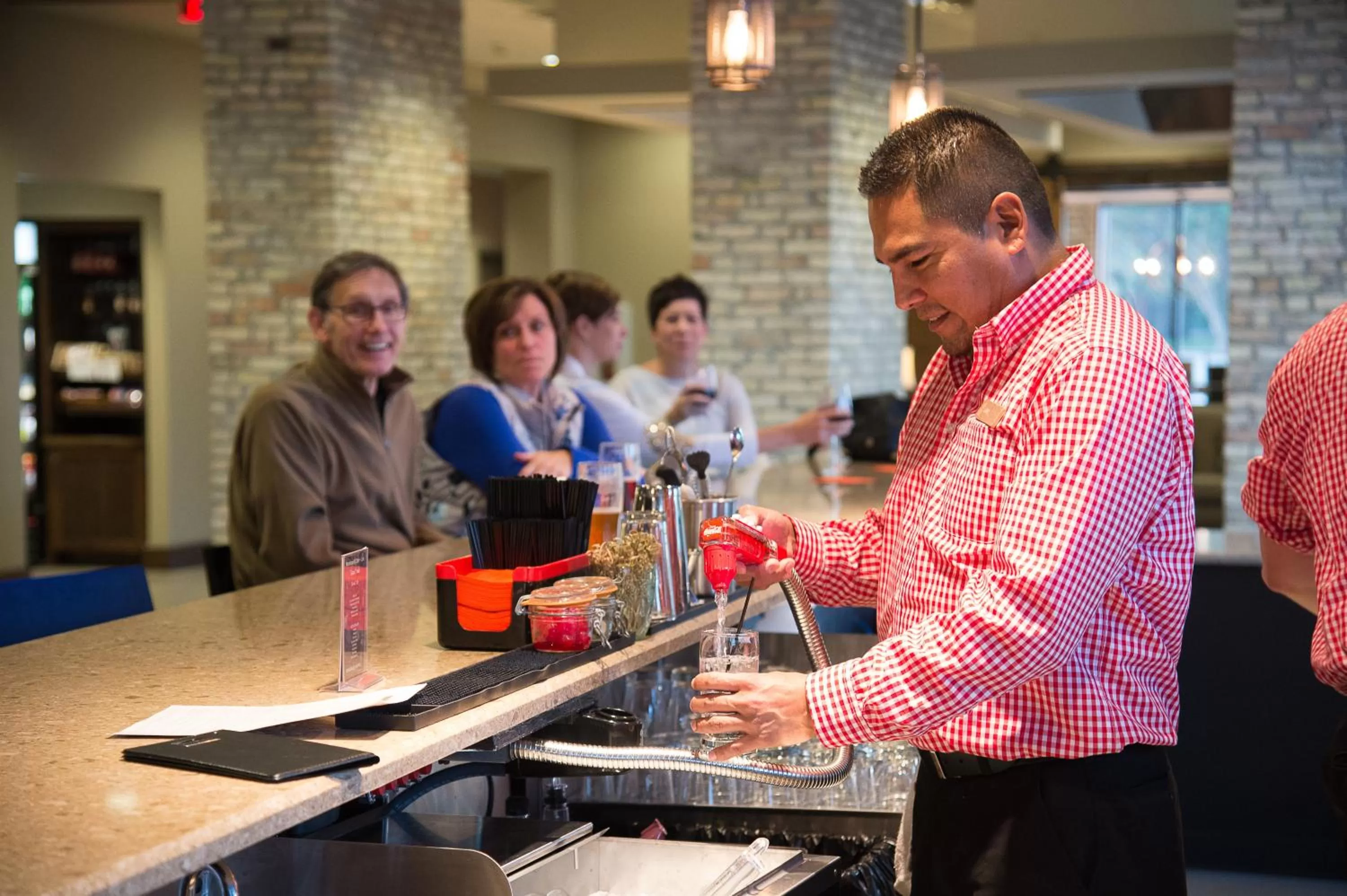 Lounge or bar in Hotel Indigo Traverse City by IHG