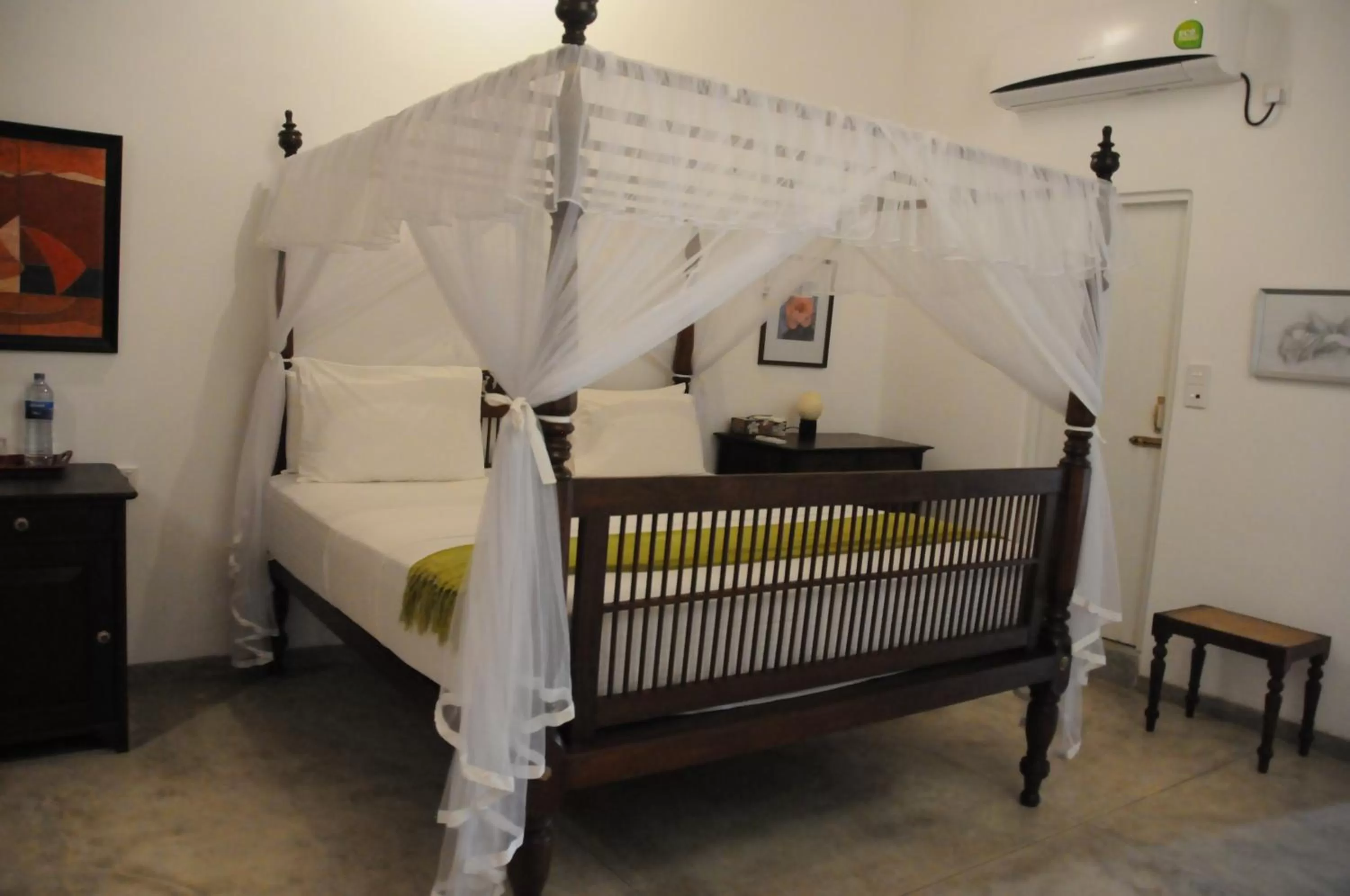 Bed in Villa Atulya at Ocean's edge