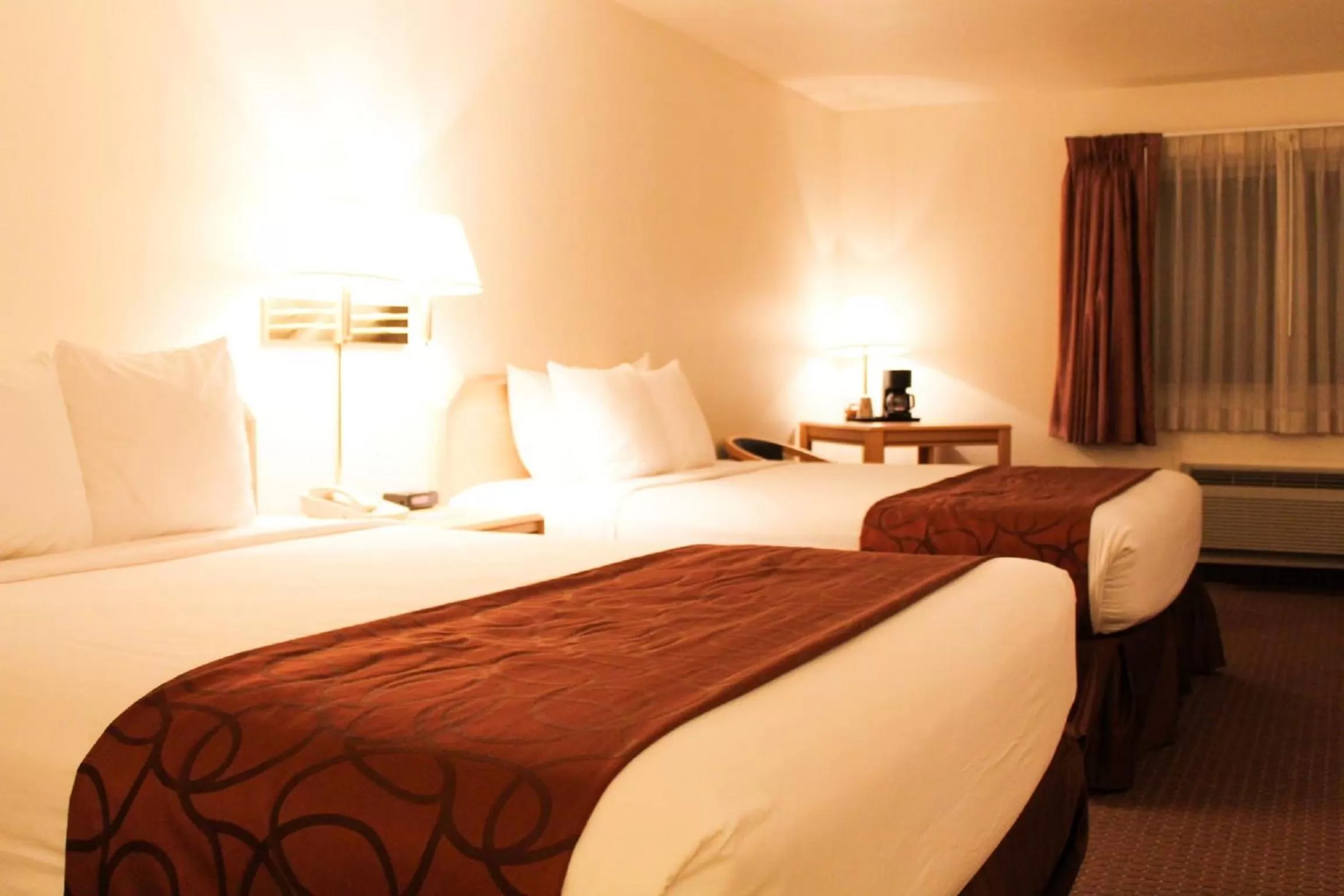 Bed in Inn at Lander, Travelodge by Wyndham