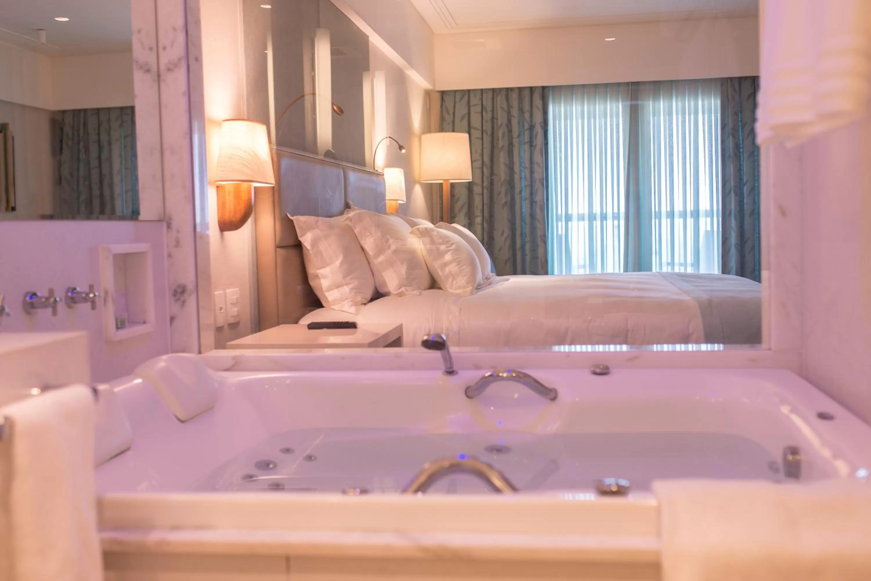Bed in Vogal Luxury Beach Hotel & SPA