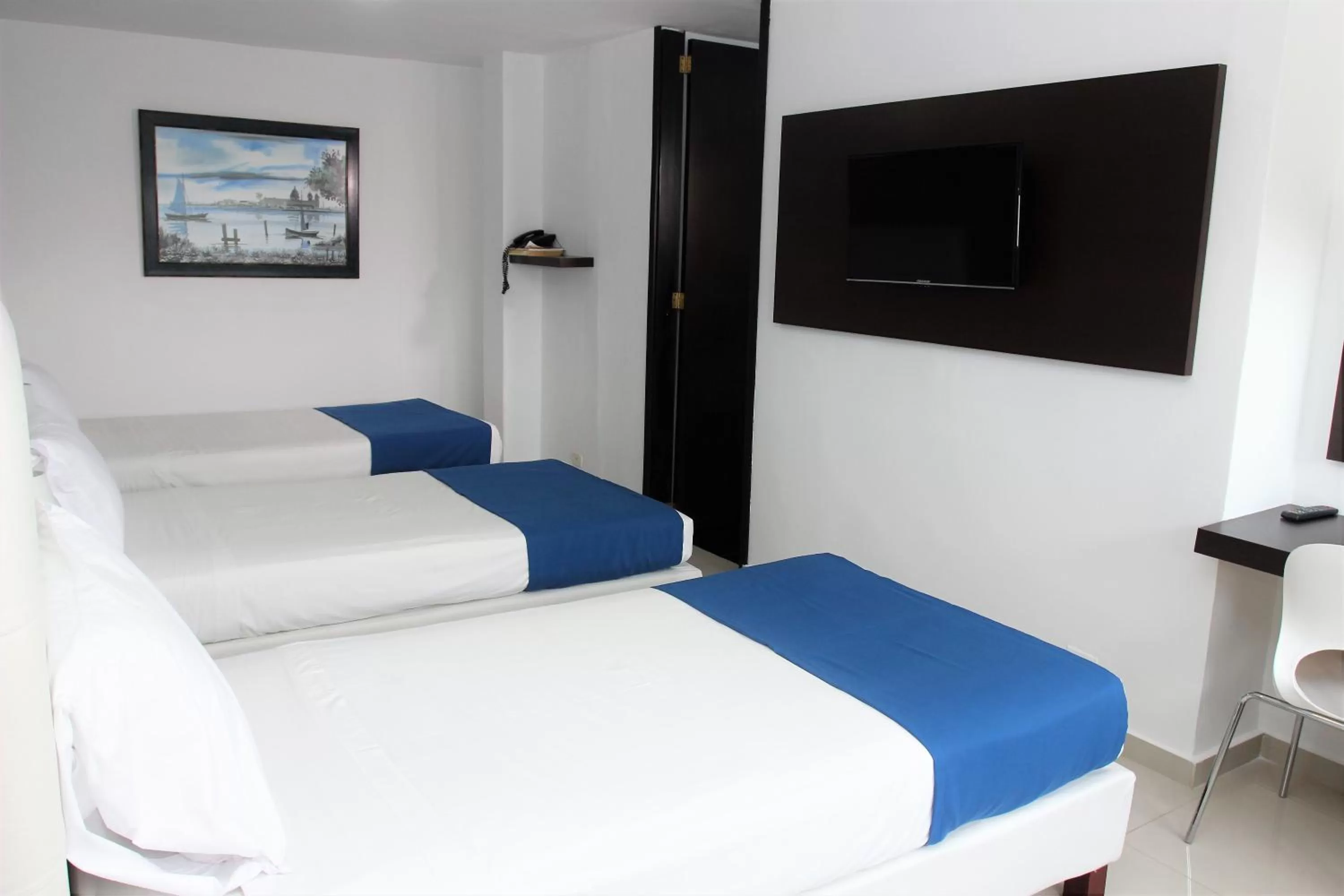 Bed in Eslait Hotel & Apartamentos