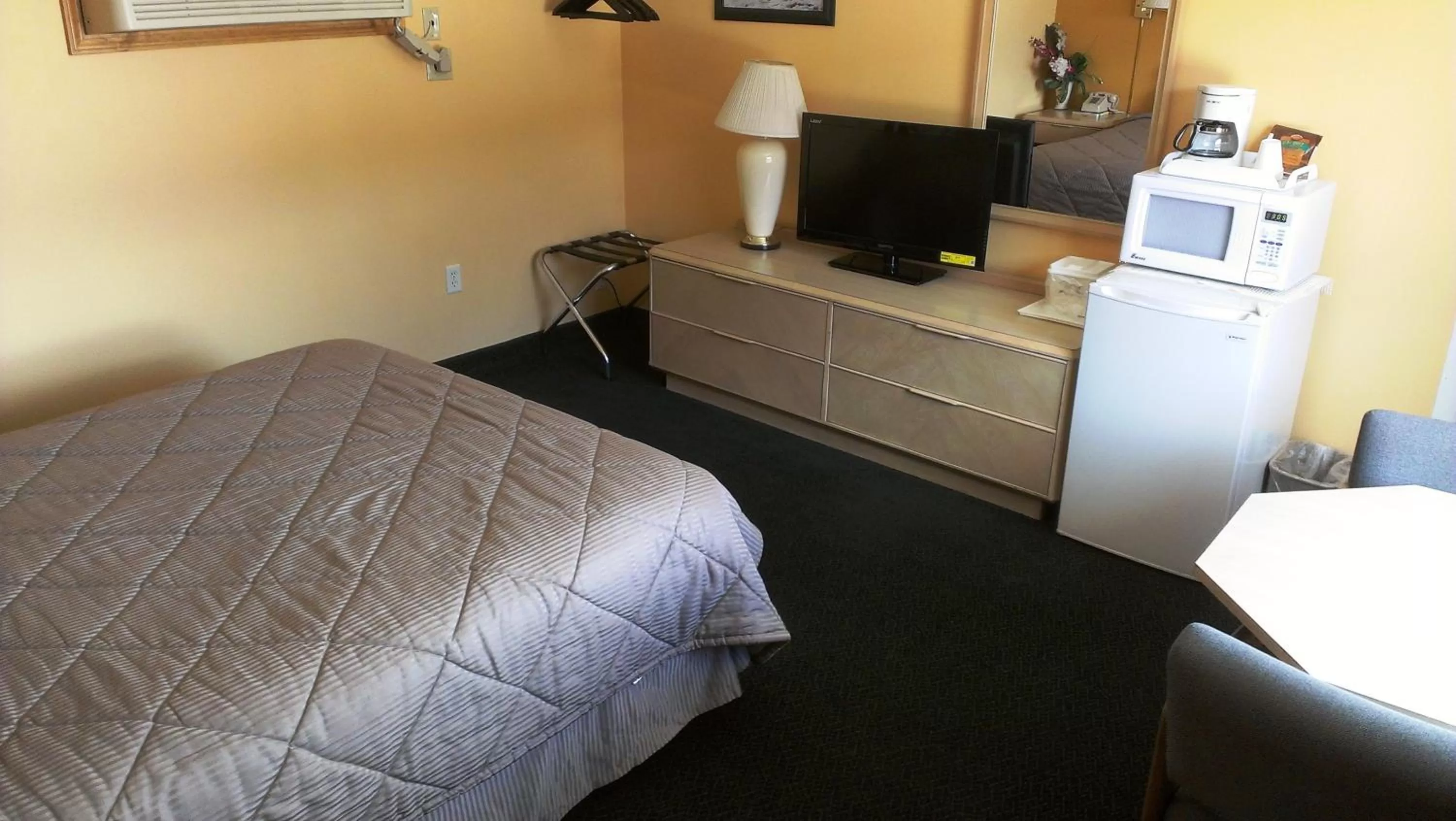 Bed in Western Motel