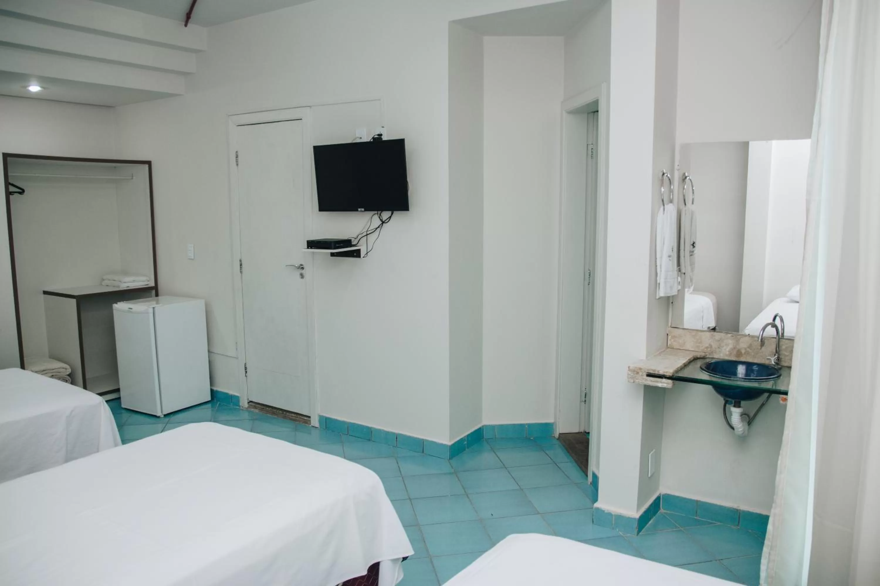 Bed in SAMIR HOTEL COMFORT