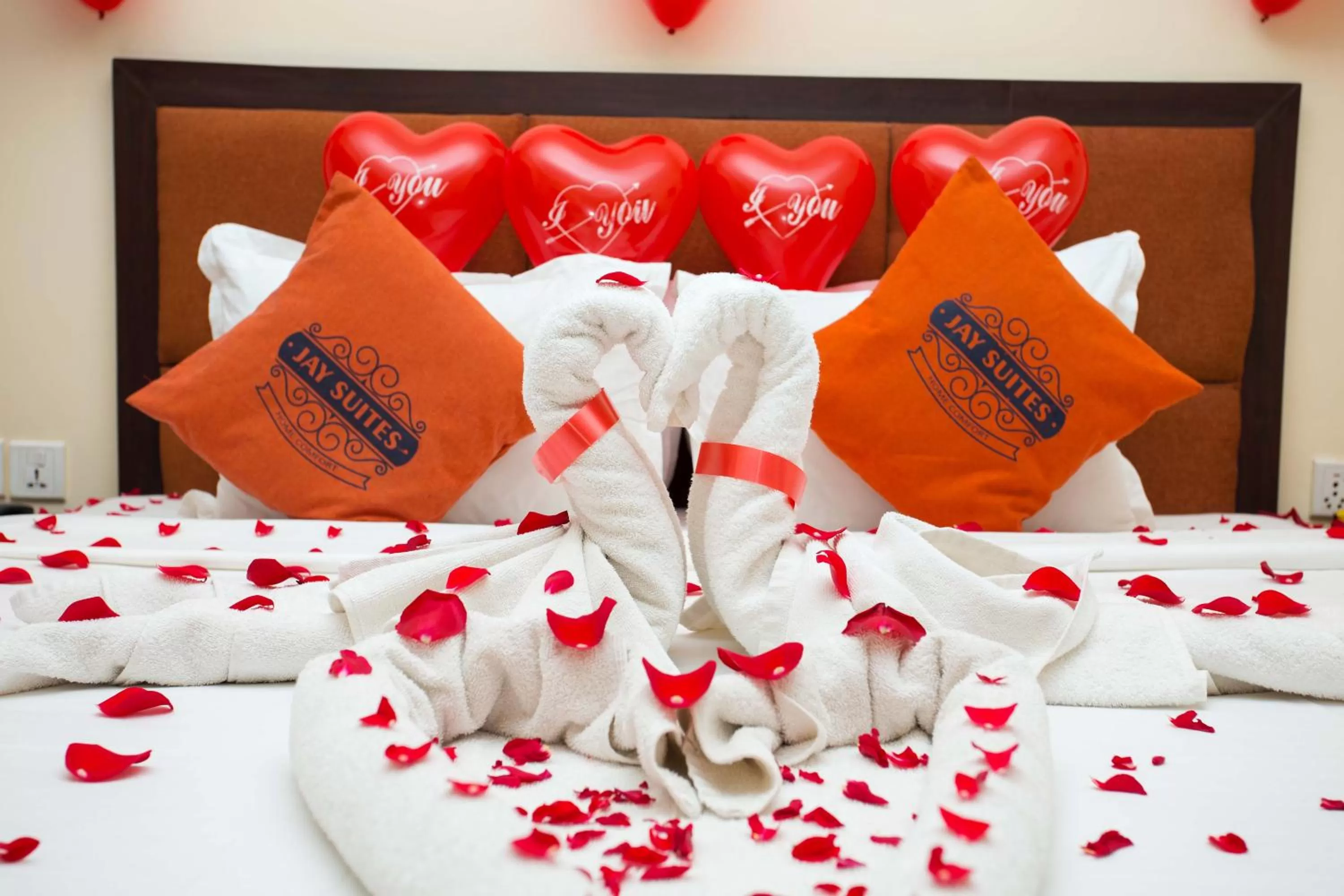 Bed in Hotel Jay Suites