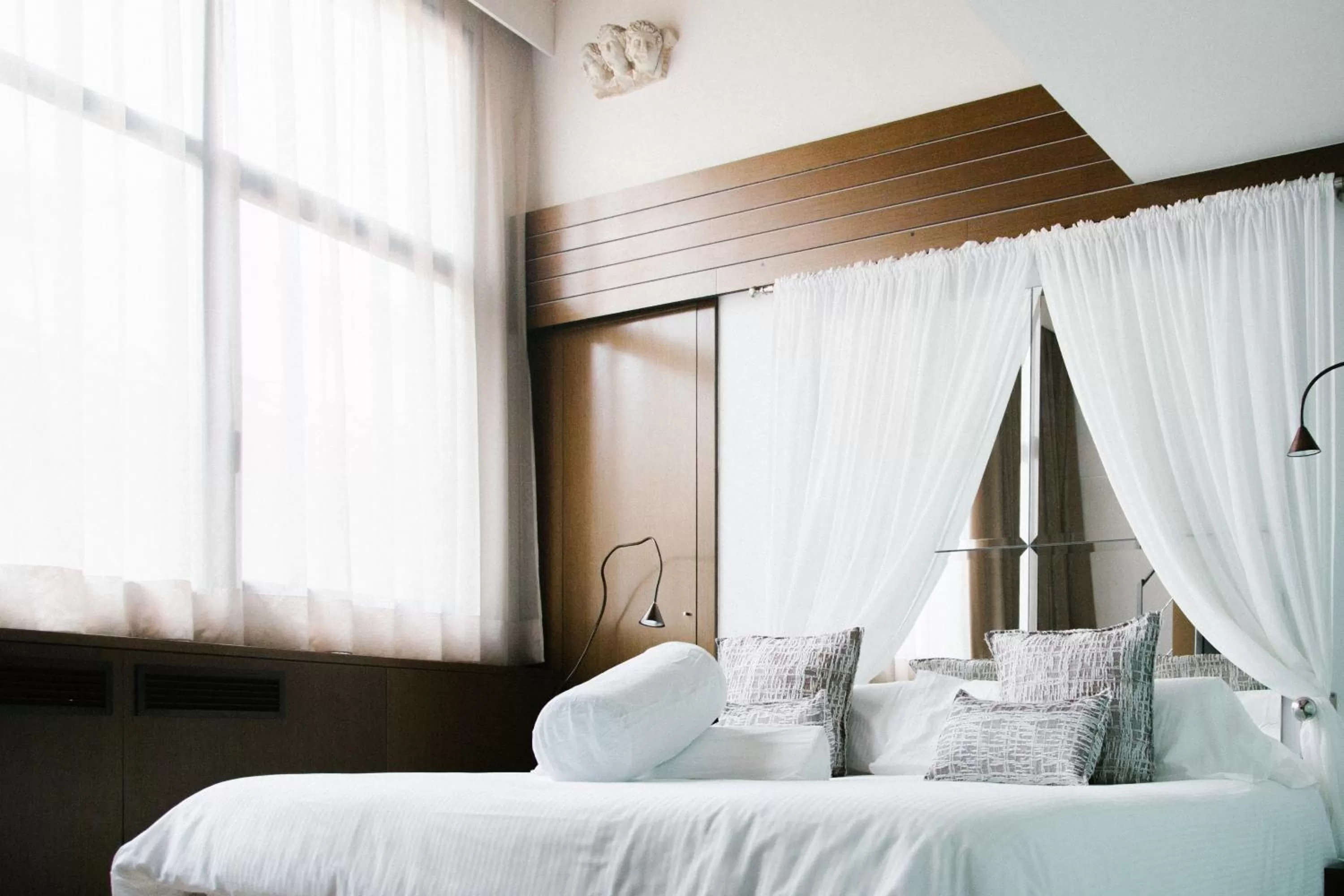 Bed in Hotel Museu Llegendes de Girona