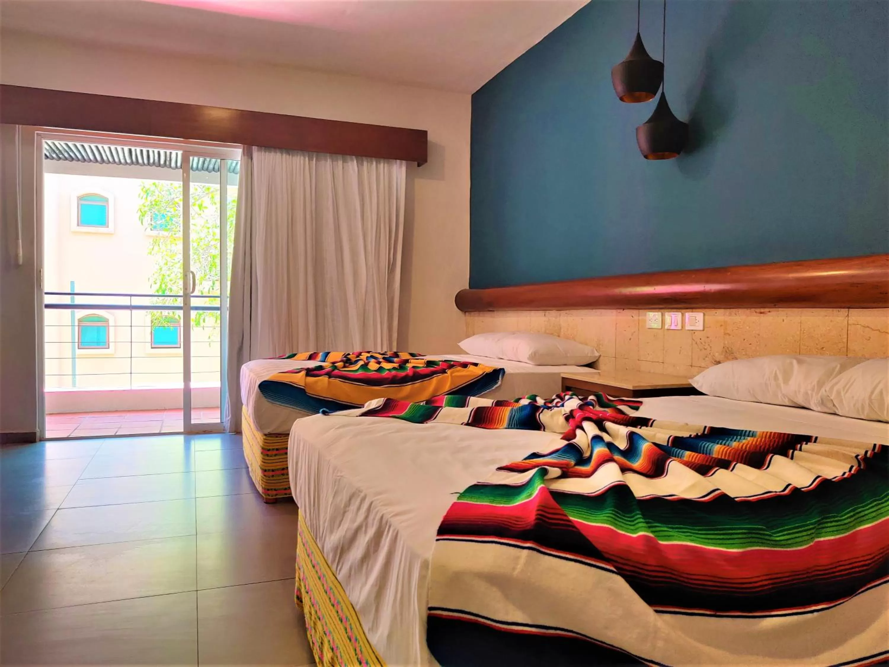 Photo of the whole room, Bed in Hotel Mariachi by Kavia 5th Av