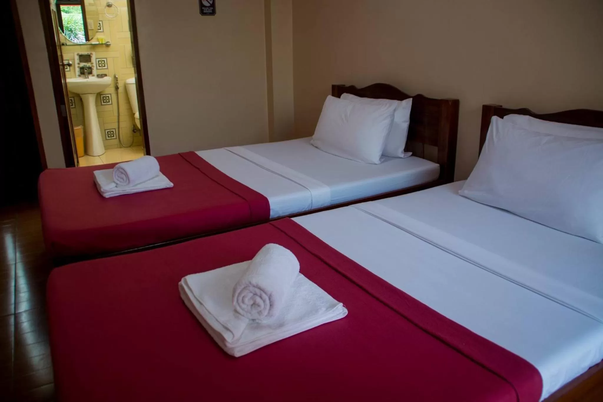 Bed in Jurias Garden Hotel