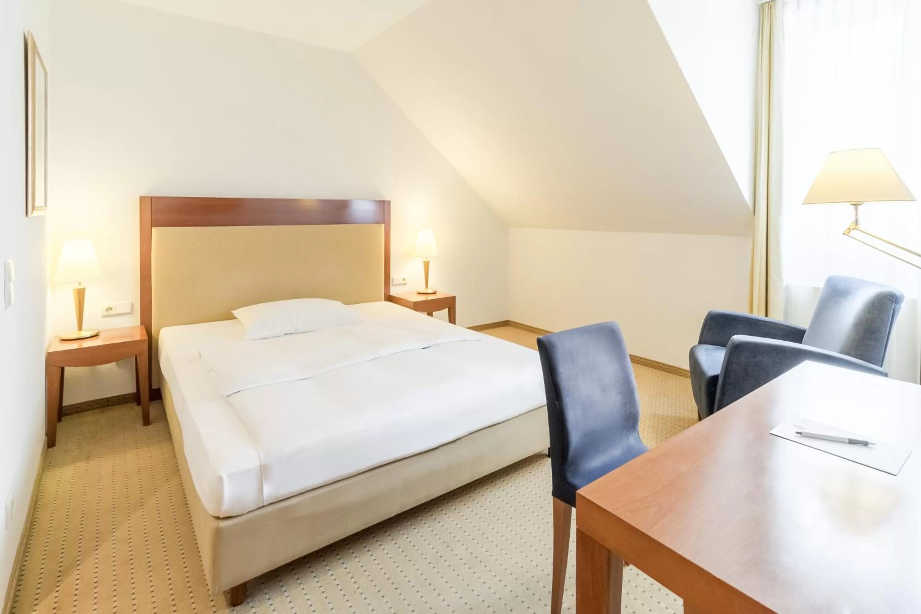 Photo of the whole room, Bed in NOVOTEL Hildesheim City