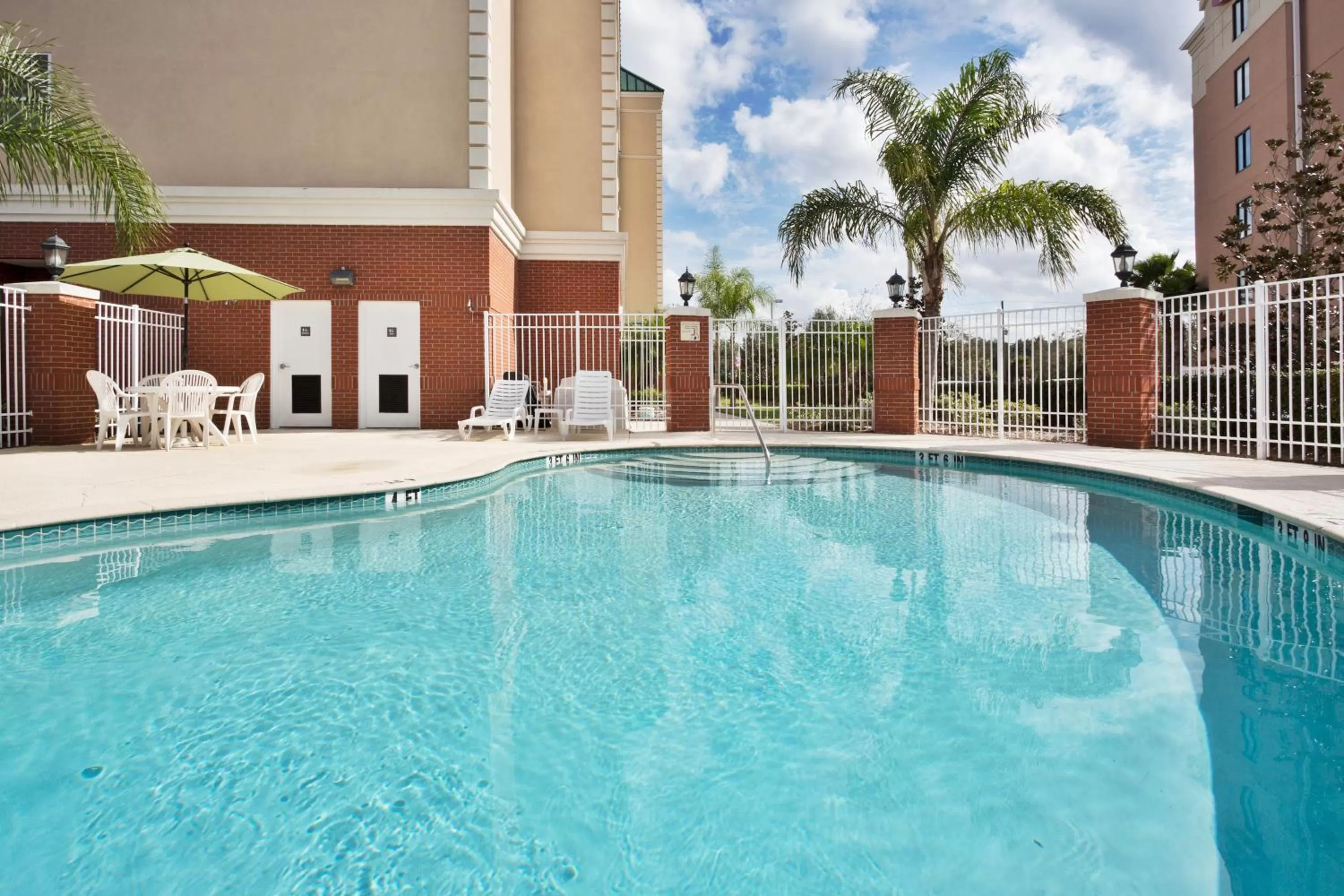 Swimming pool in Country Inn & Suites by Radisson, Tampa-Brandon, FL