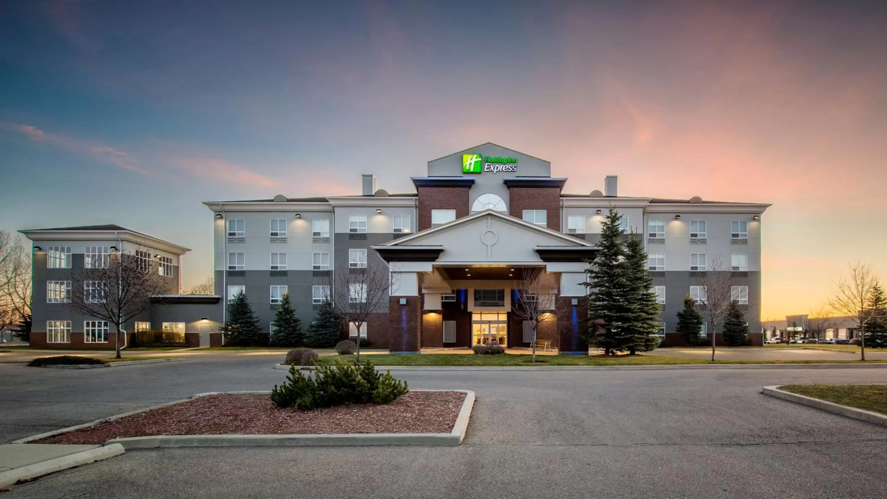 Property building in Holiday Inn Express Airdrie by IHG