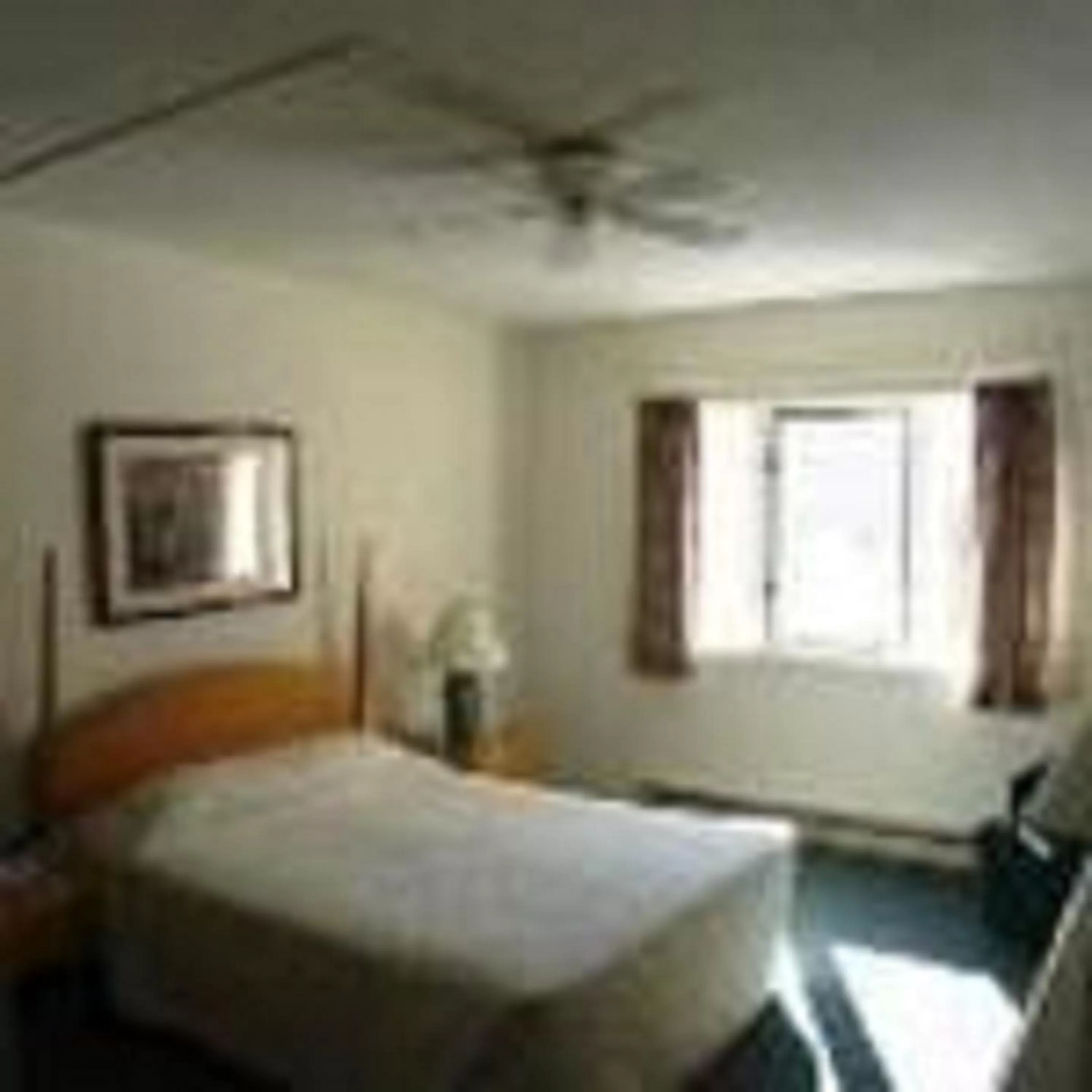 Bed in Rivergreen Resort