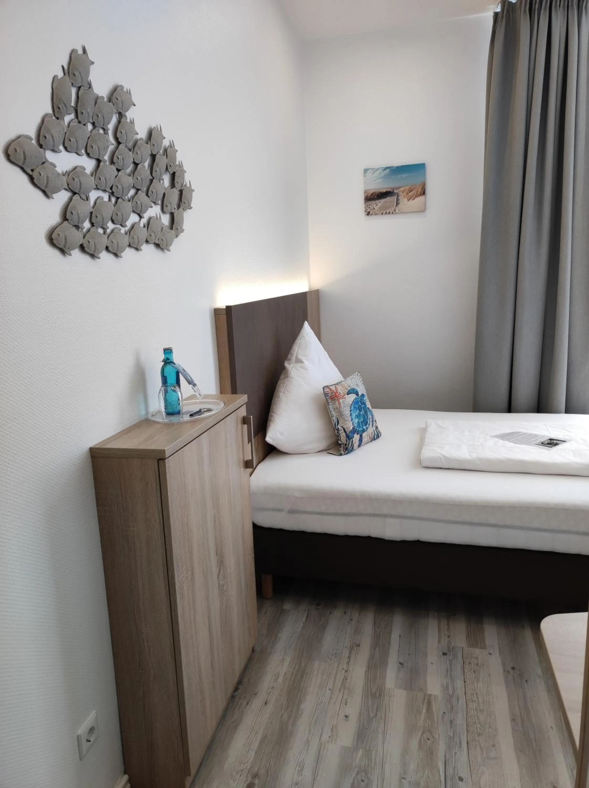 Photo of the whole room, Bed in Nordsee Hotel Borkum