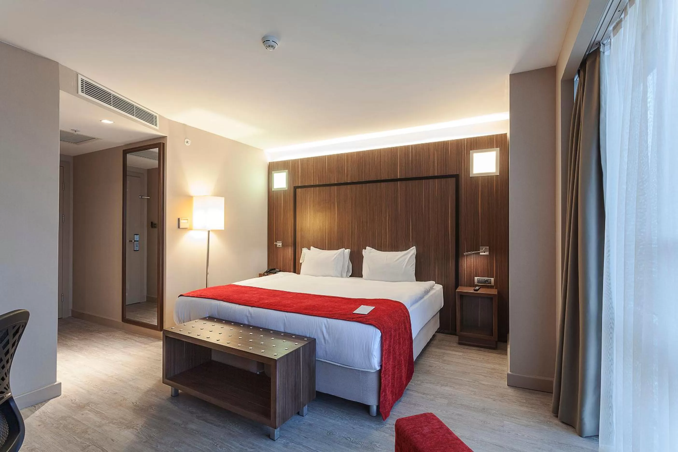 Photo of the whole room, Bed in Ramada Encore by Wyndham Izmir