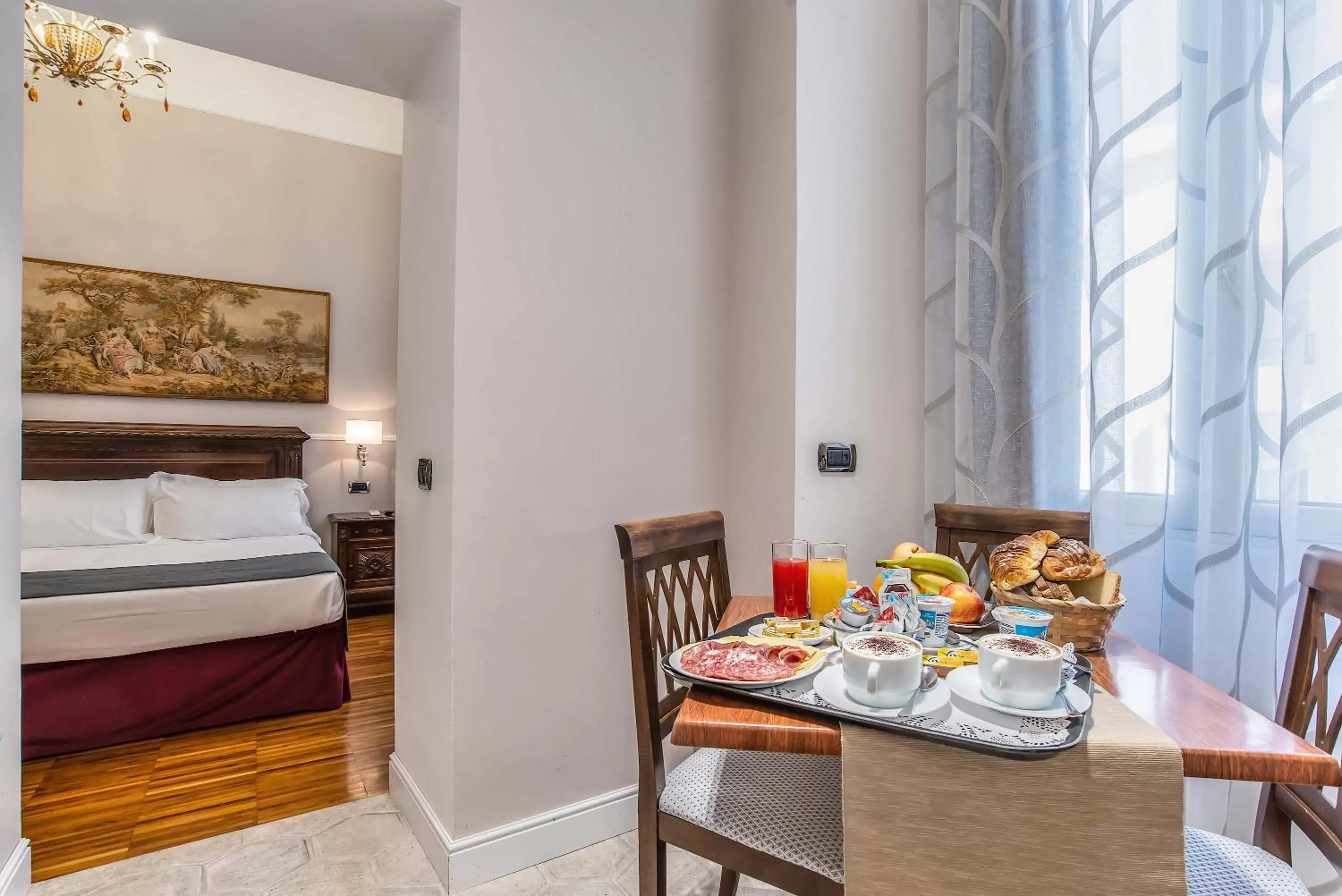 Bed in I TRE MOSCHETTIERI - D'ARTAGNAN Luxury Guest House