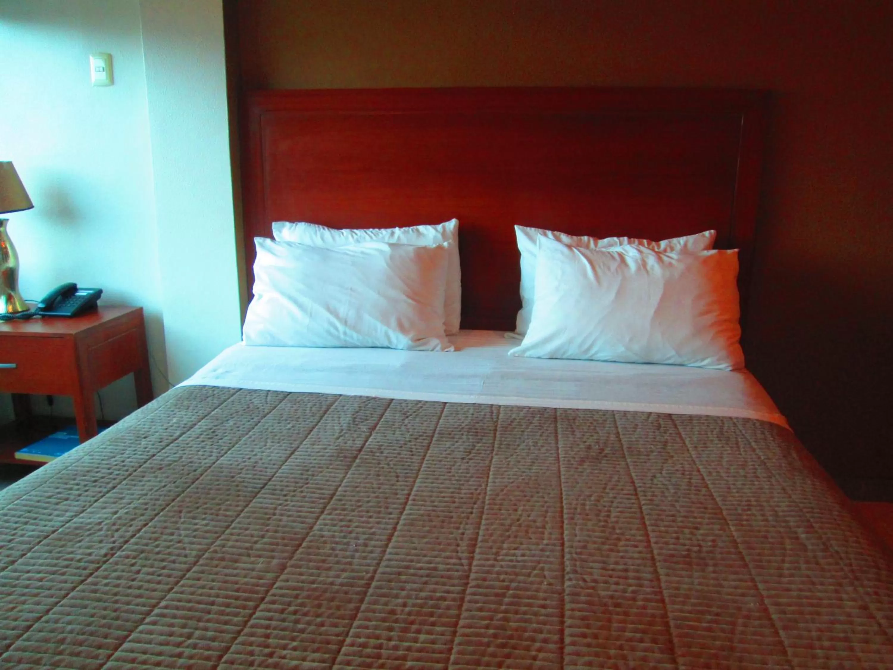 Bed in Hotel Garzota Inn