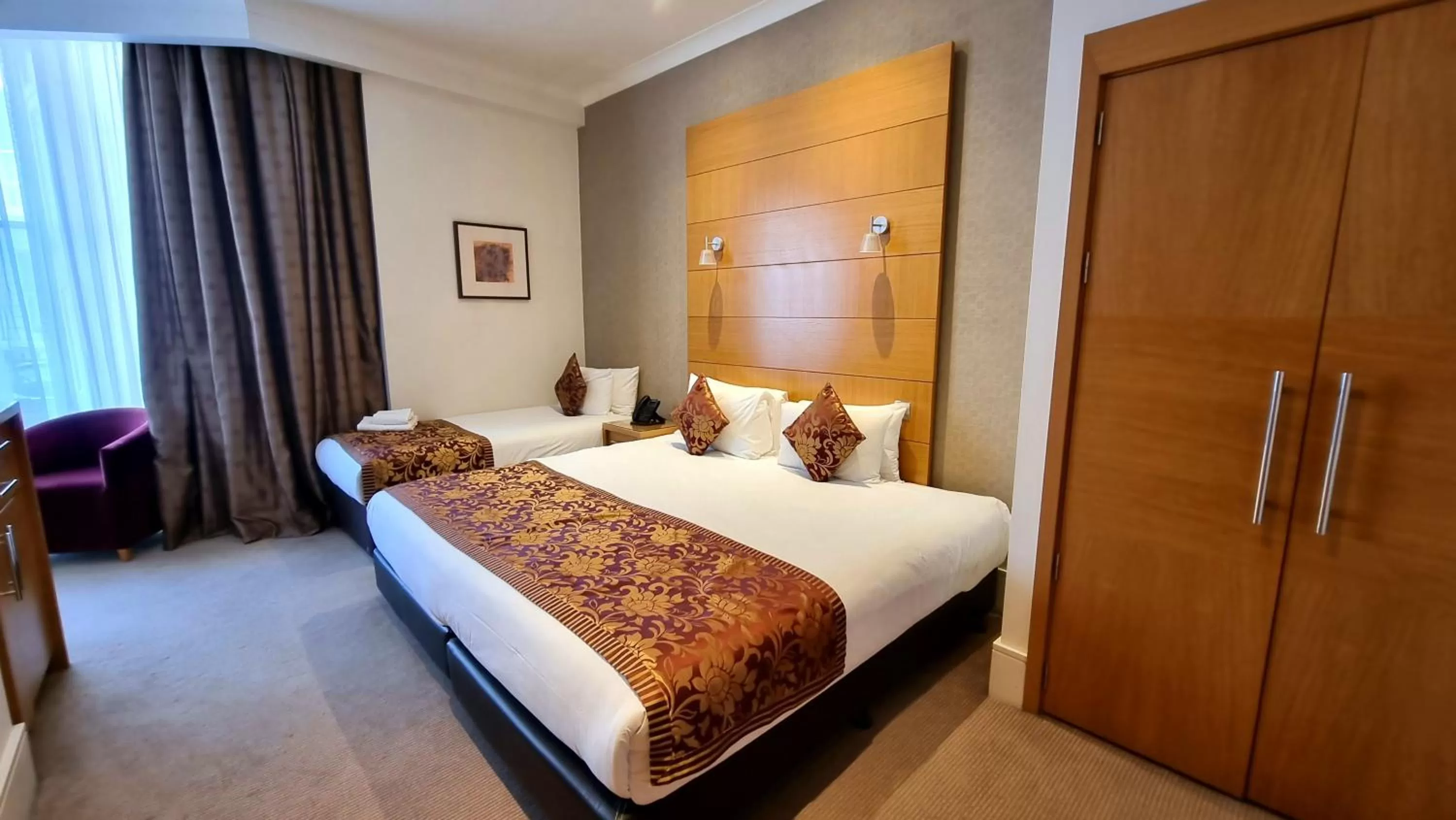 Bedroom, Bed in The Park City Grand Plaza Kensington Hotel