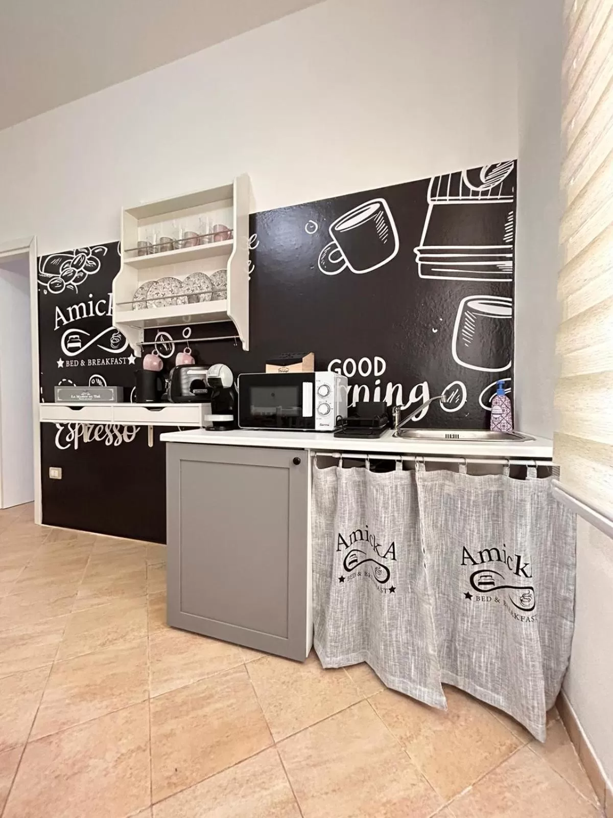 Property logo or sign, Kitchen/Kitchenette in Amicka B&B