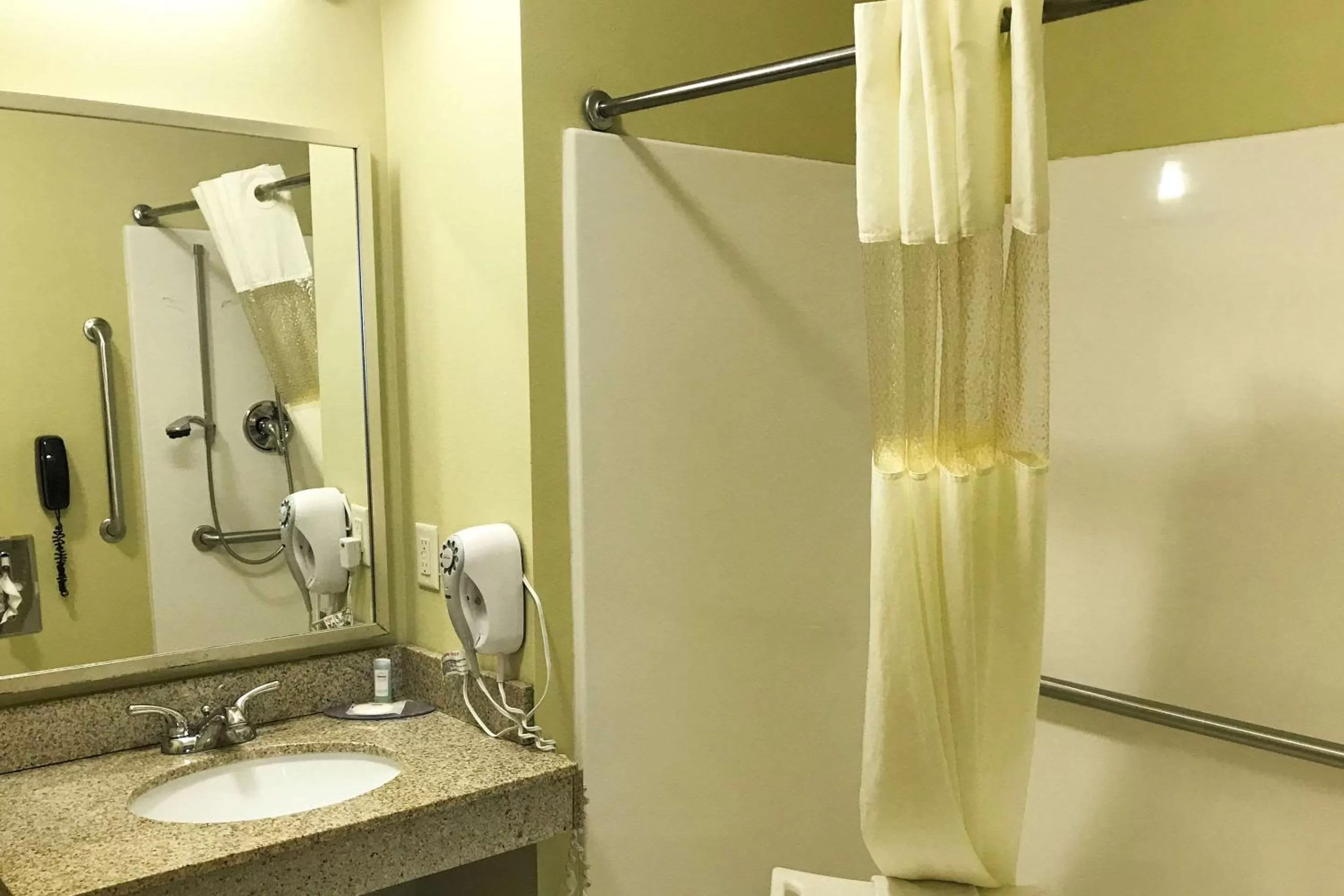 Bedroom in Suburban Studios Cedar Falls