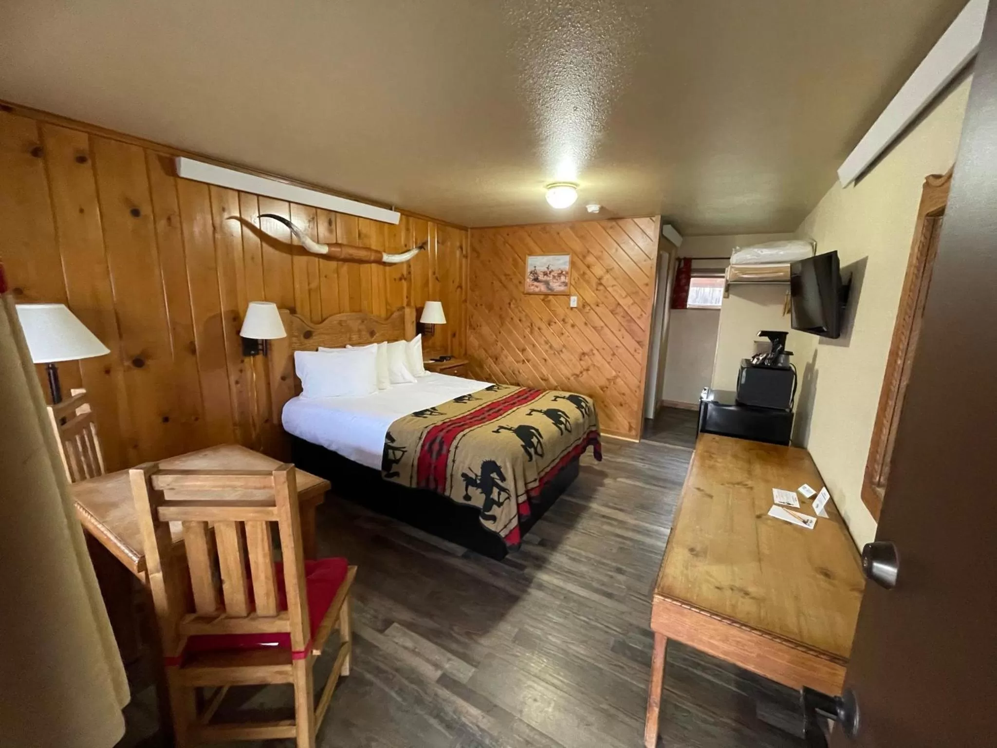 Bed in The Longhorn Ranch Resort Lodge & RV Park