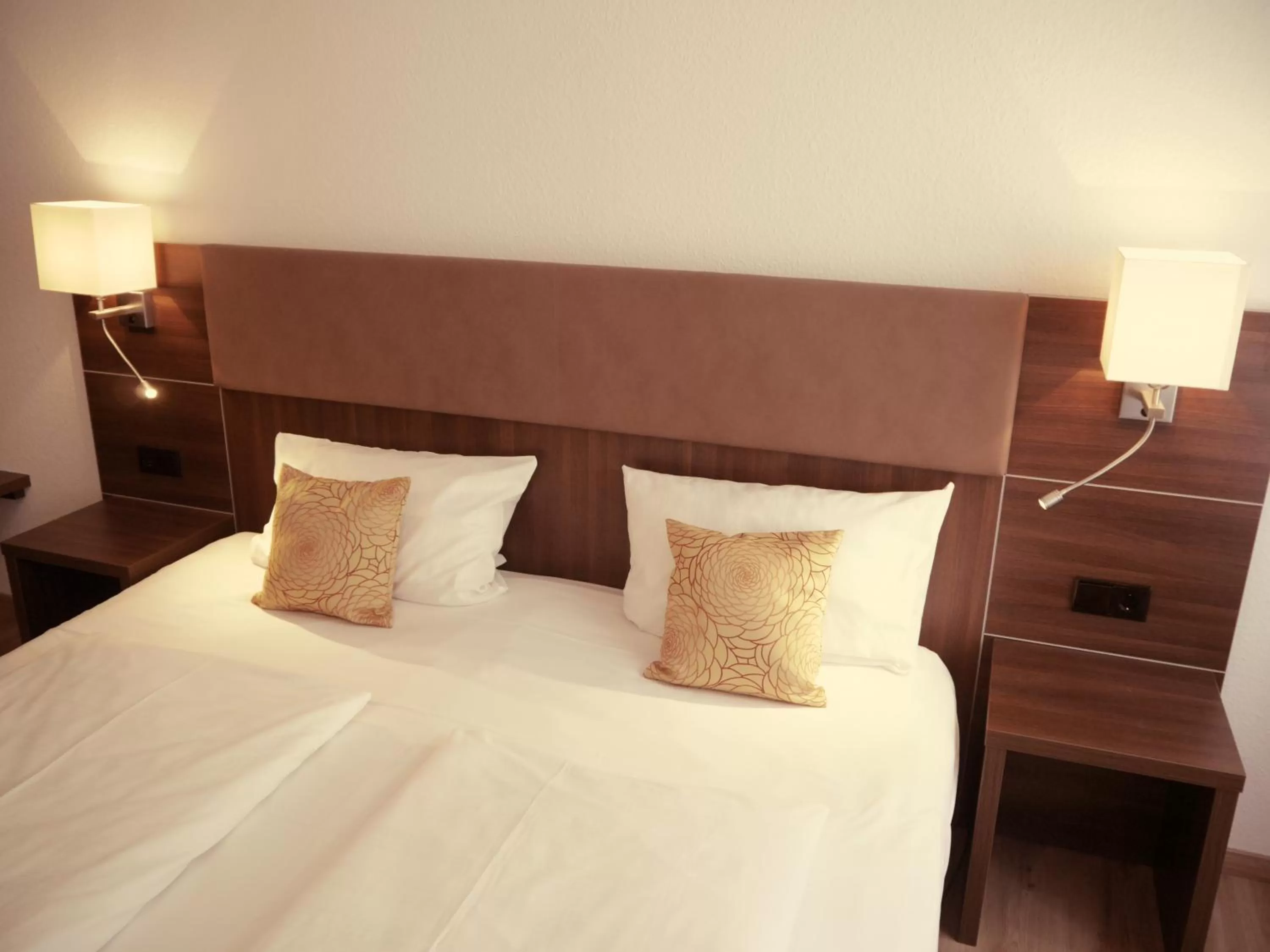 Bed in Romantica Hotel Blauer Hecht