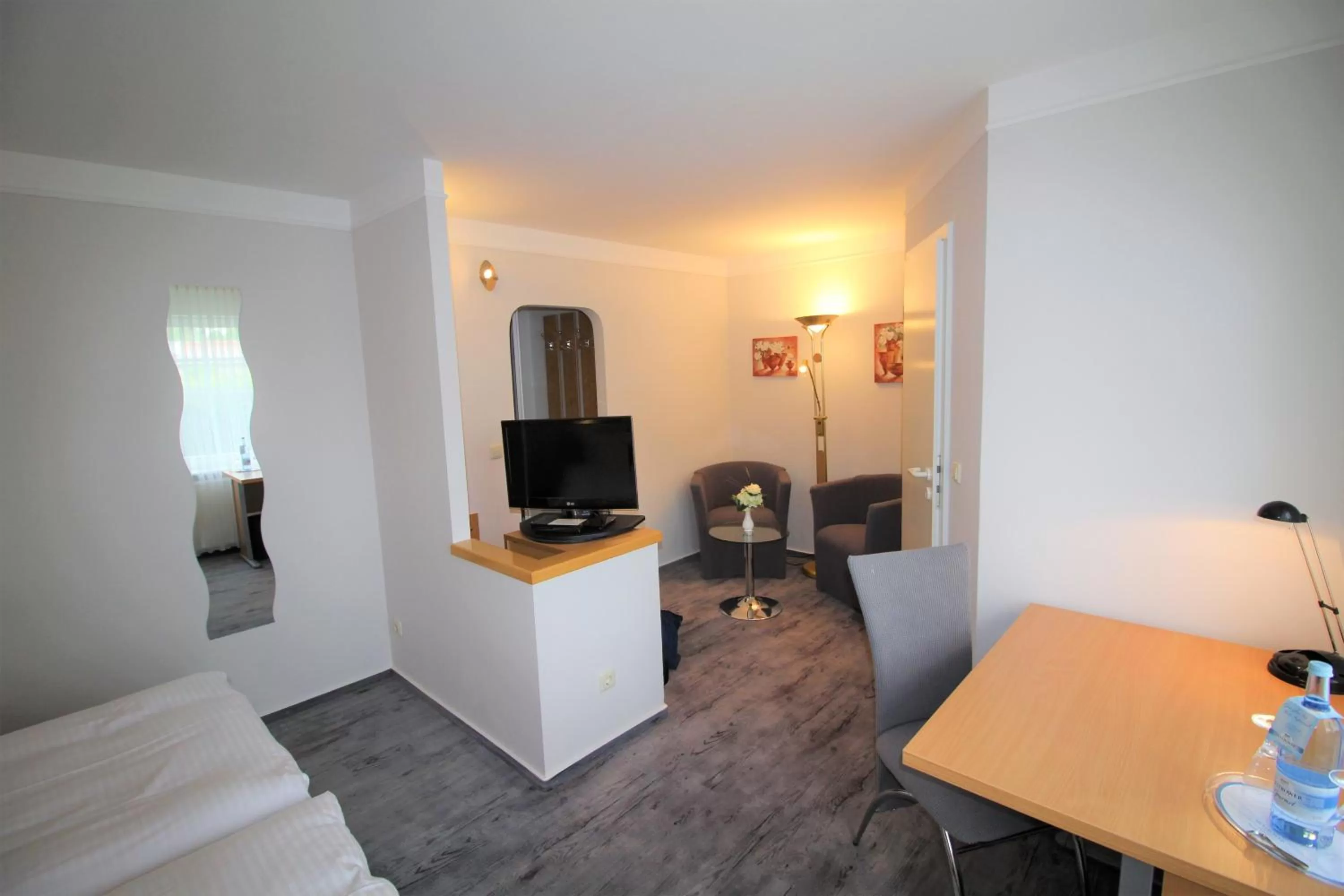 Photo of the whole room, Bed in Parkhotel Klüschenberg