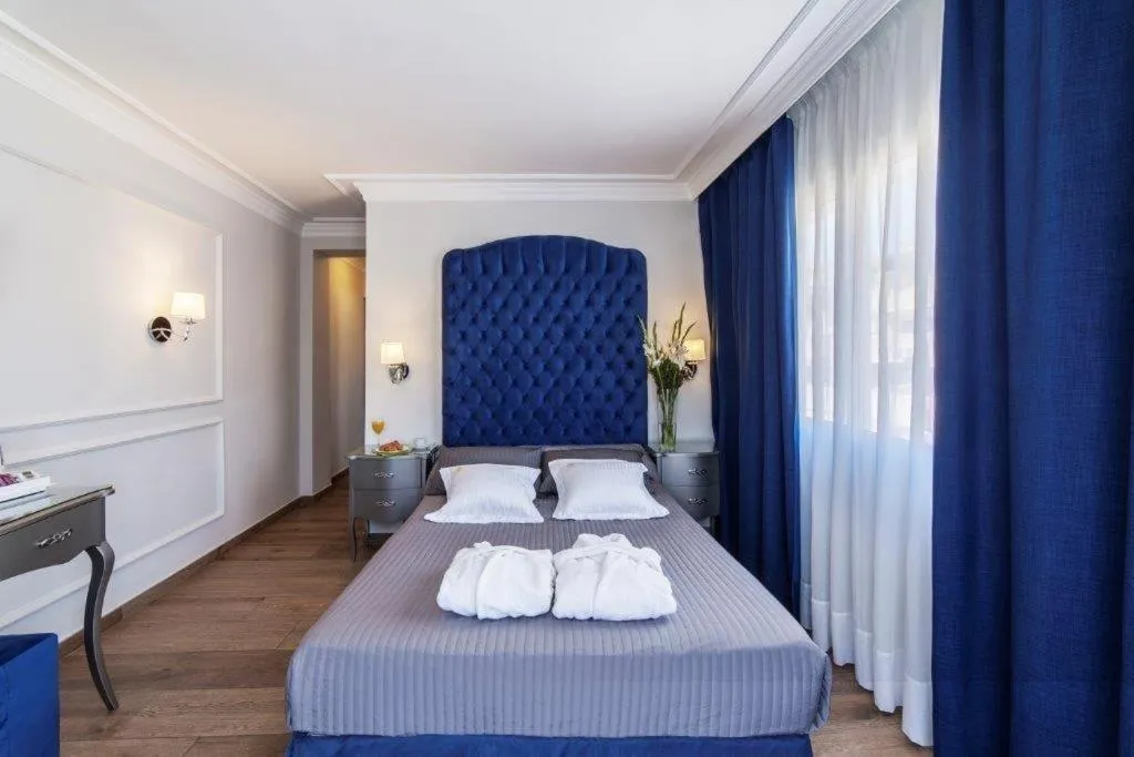 Bed in Essence Hotel Boutique