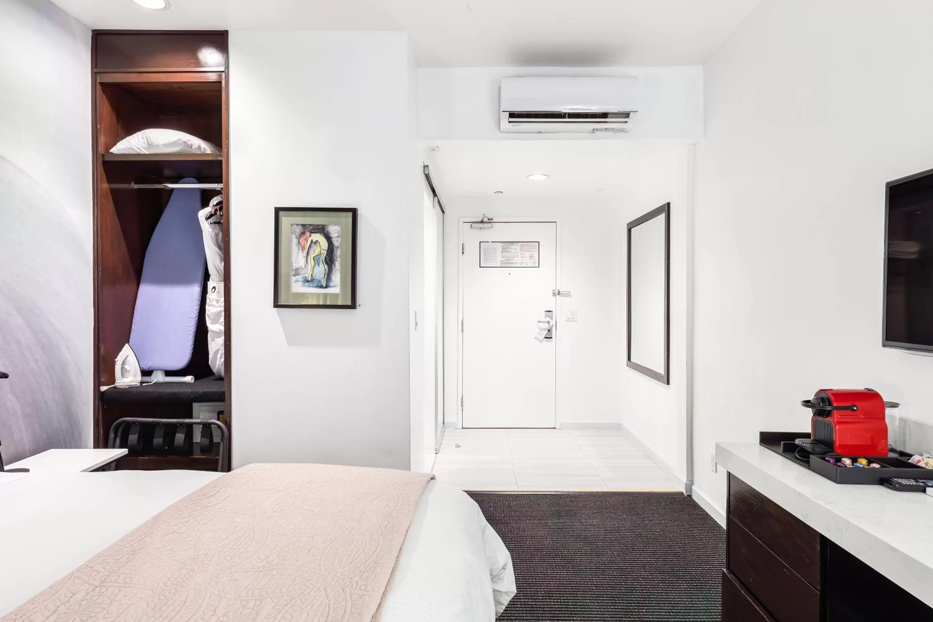 flat iron, Bed in The O Hotel, Trademark Collection by Wyndham