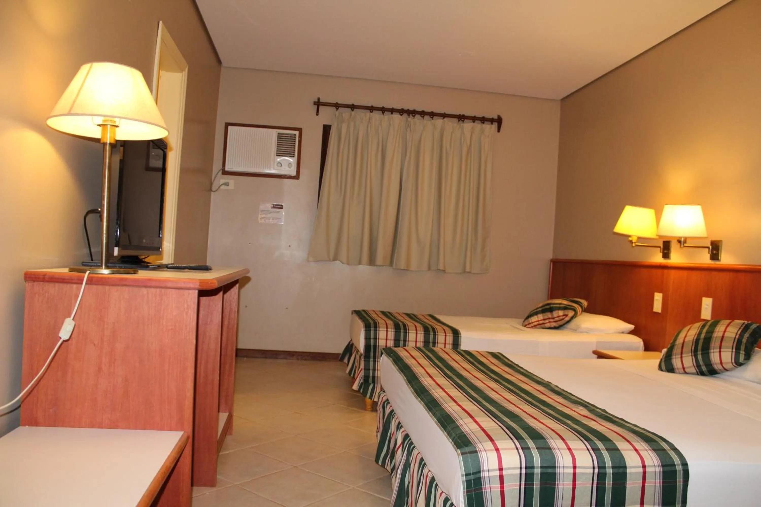 Photo of the whole room, Bed in Marcopolo Suites Iguazu