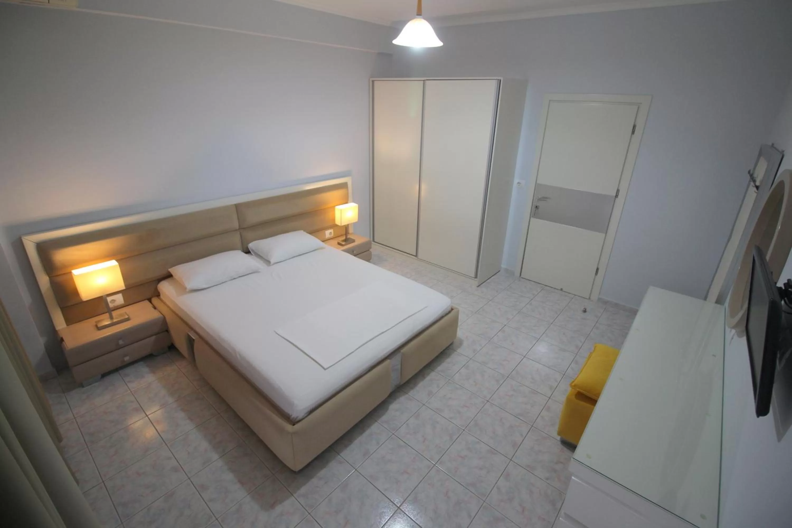 Bed in Murati Suites Sarandë