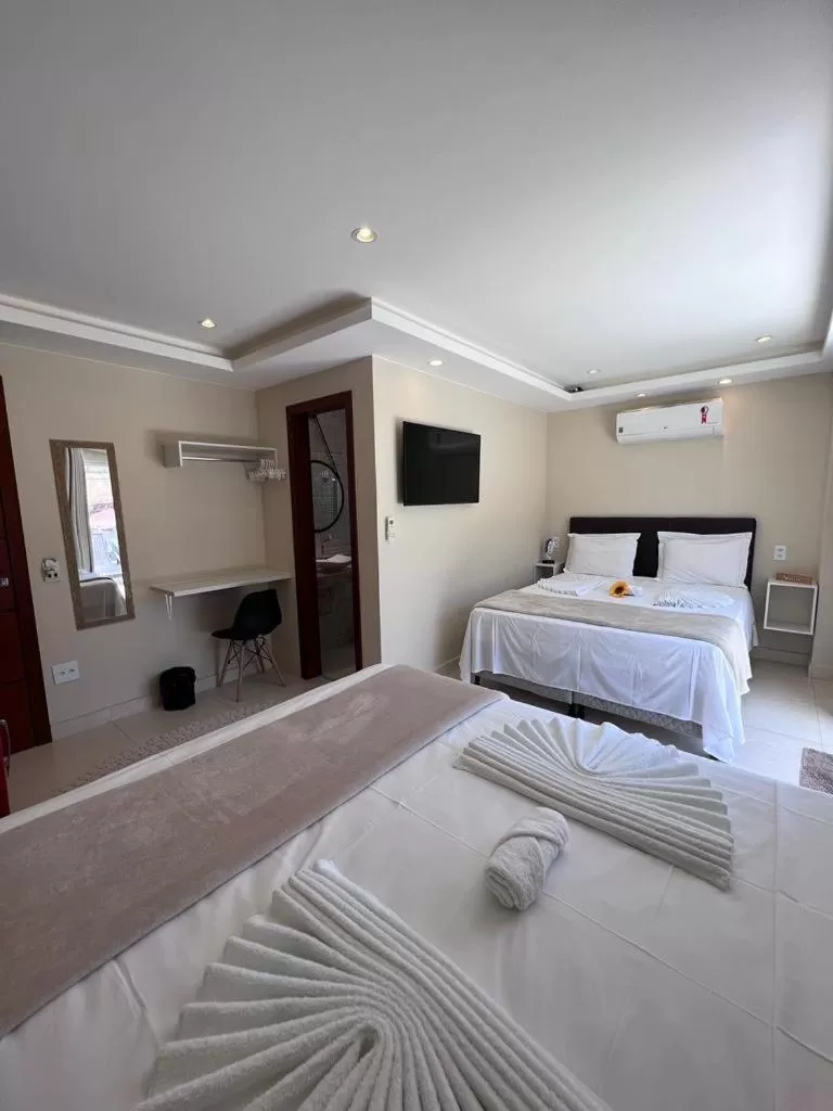 Bed in Pousada Arraial Tropical