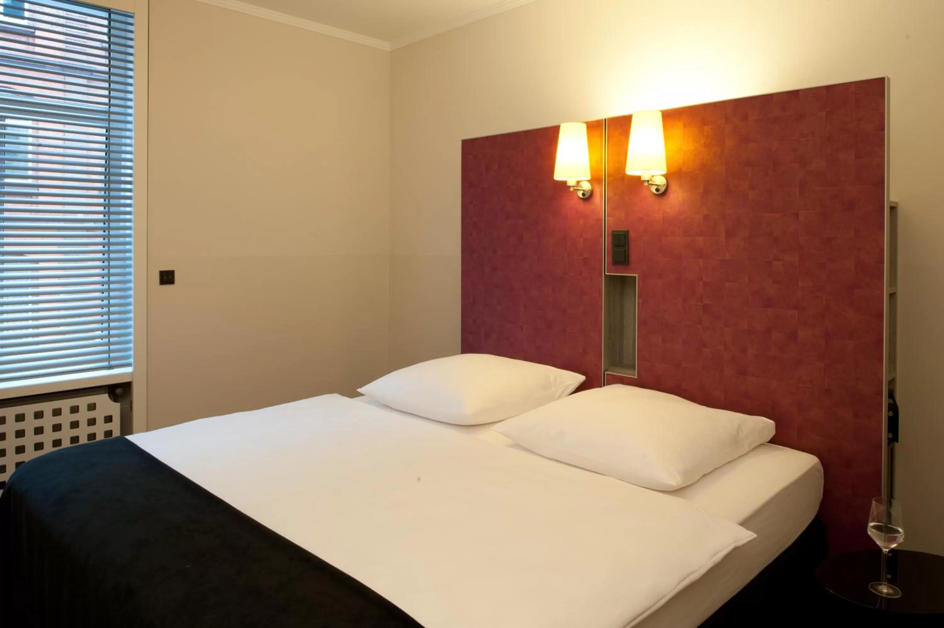 Bed in Hotel Topas Frankfurt City Centre