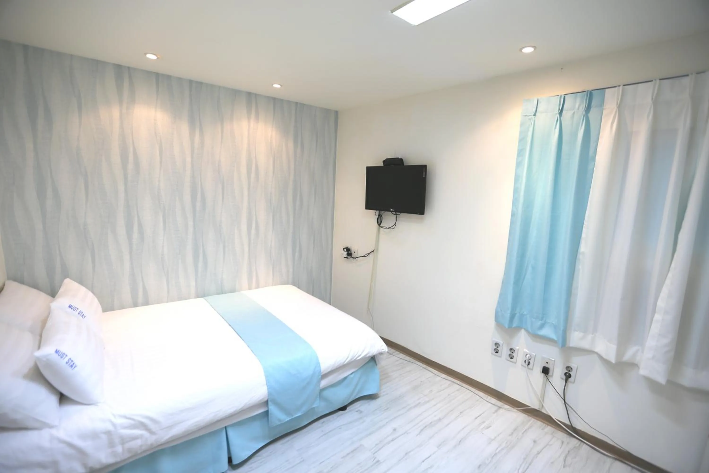 Bed in Must Stay Hotel Myeongdong