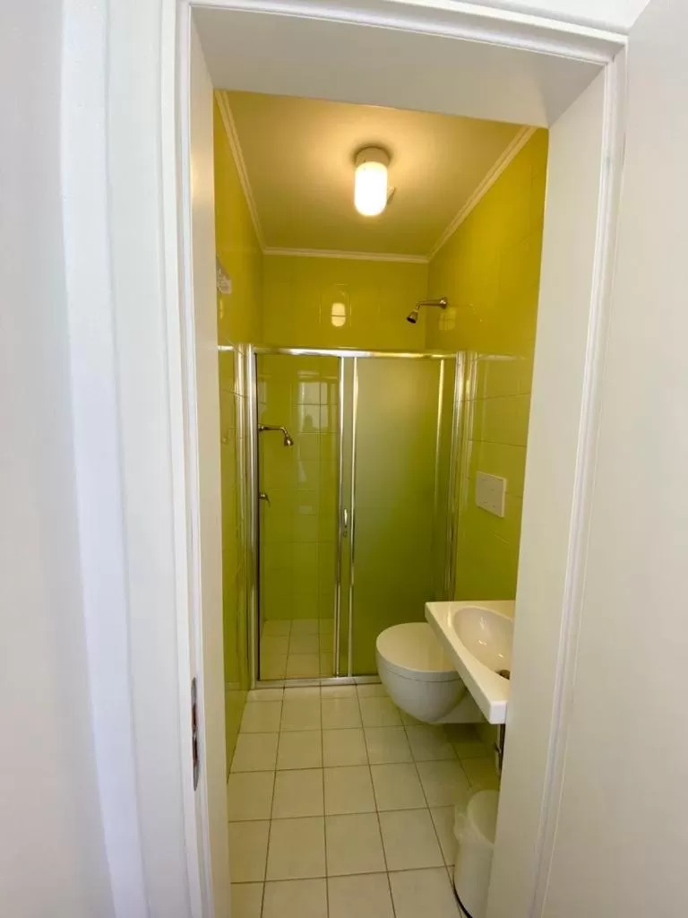 Bathroom in Aleksi rooms