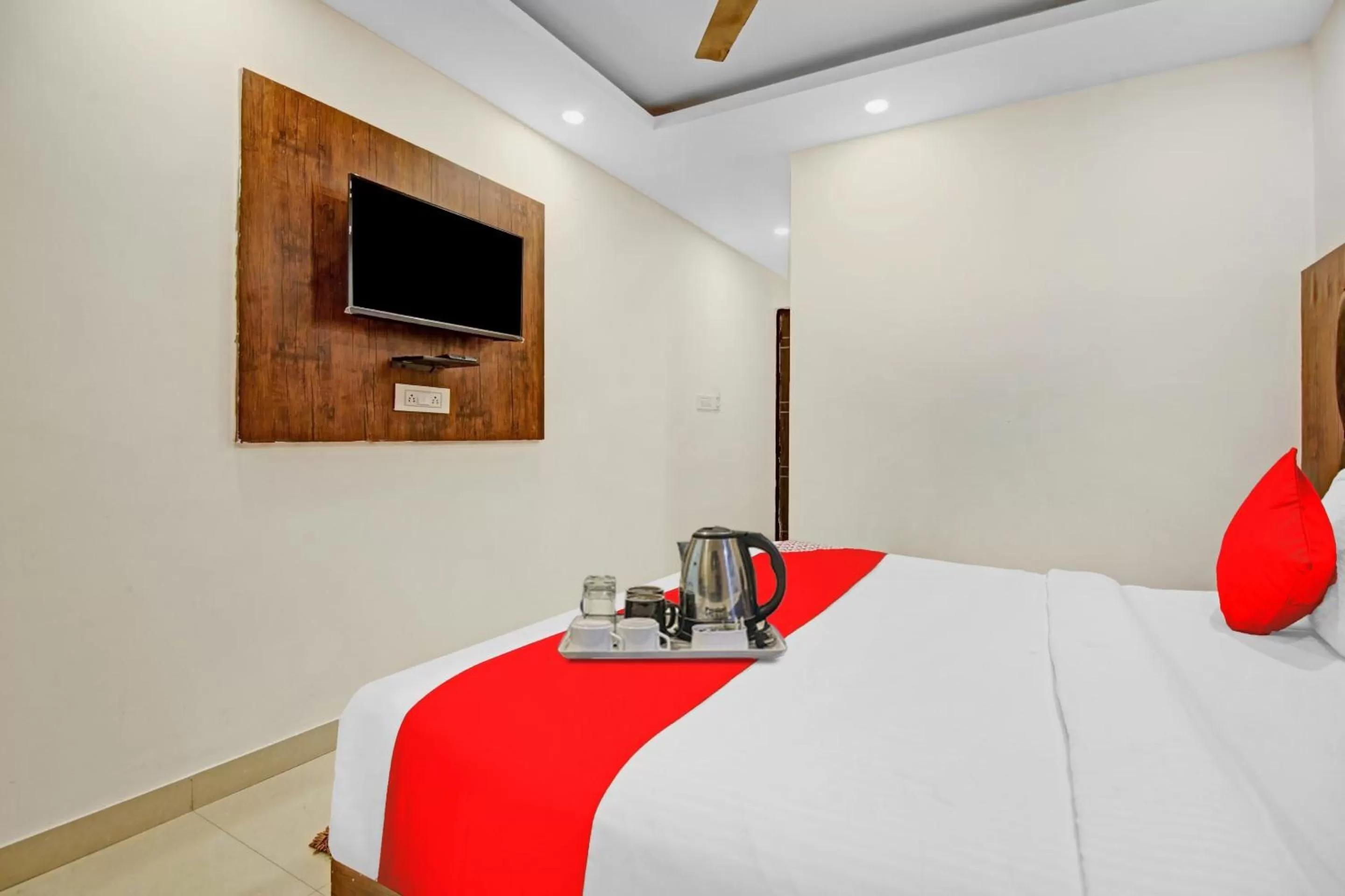 Bedroom in Super OYO Flagship Hotel Tez Plaza